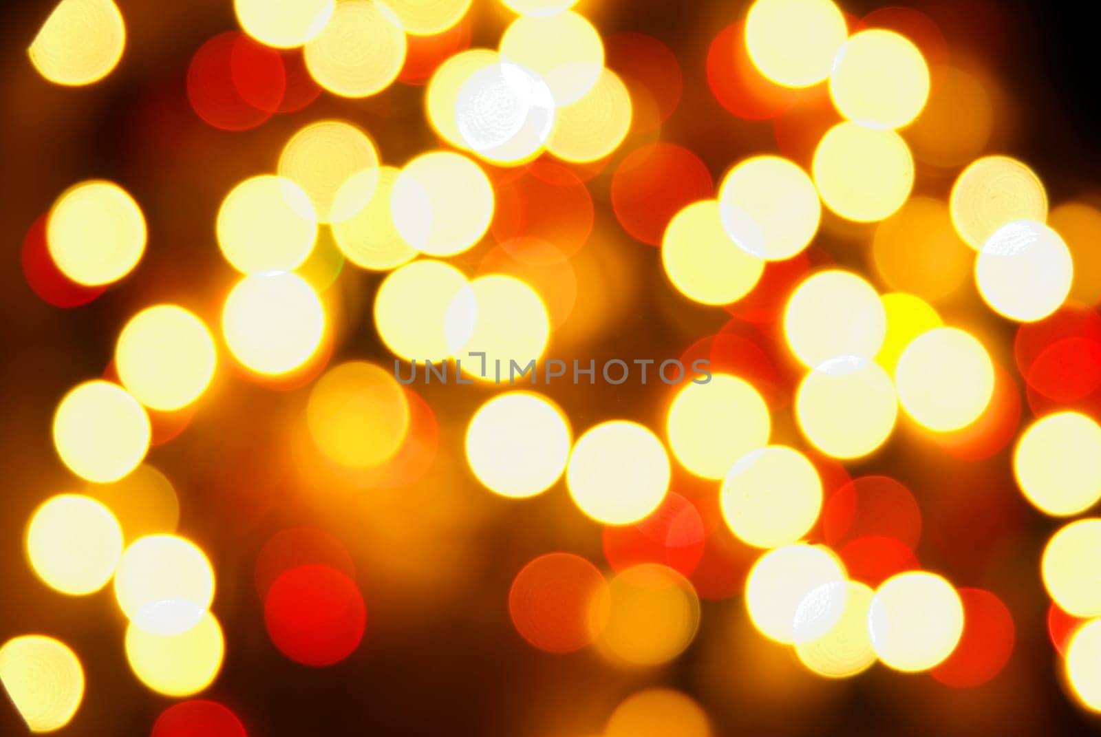 Abstract christmas lights as background on black