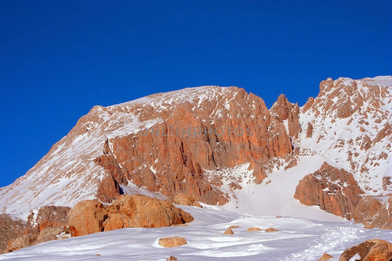 a view from top of mountain in winter