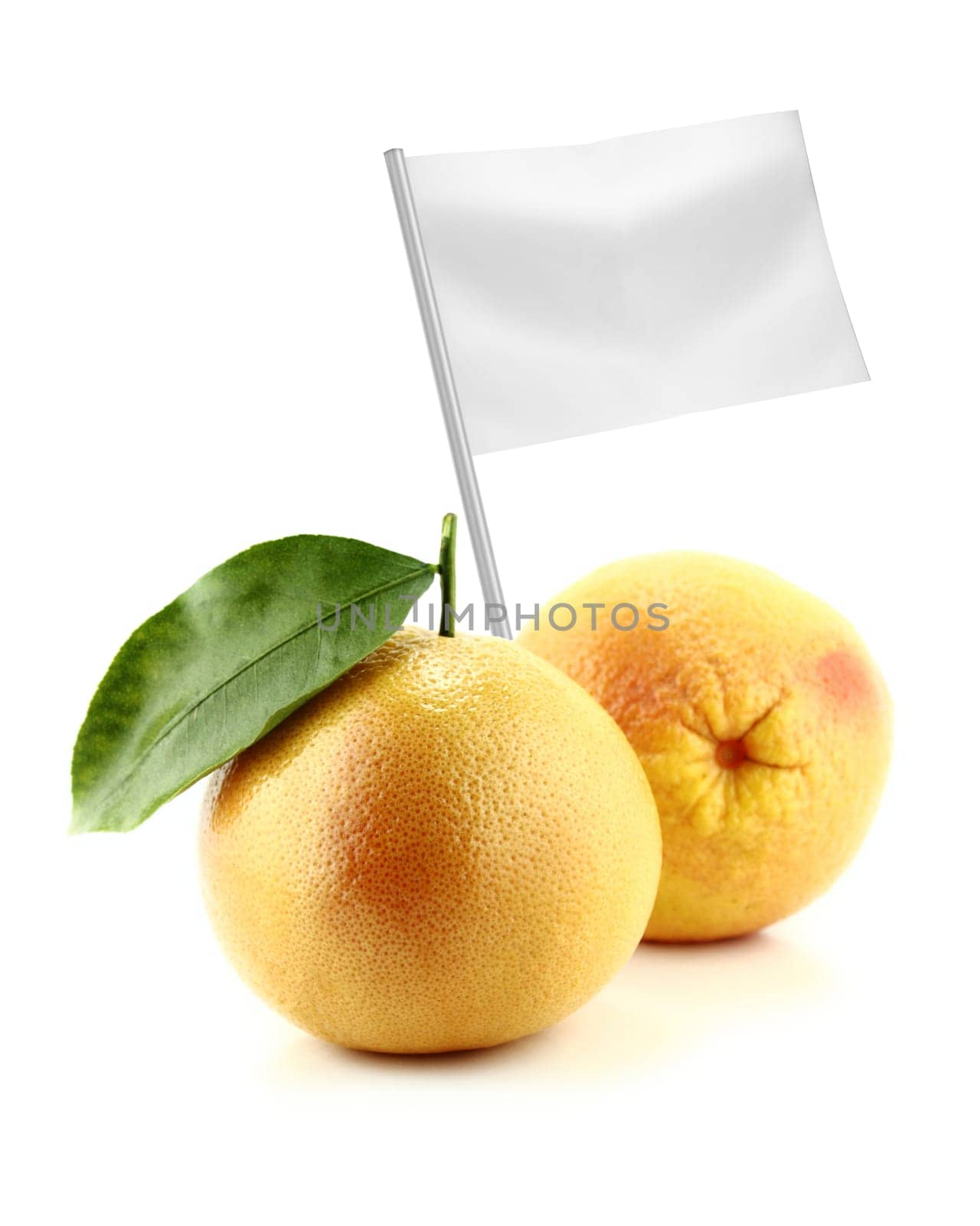 Healthy and organic food concept. Fresh Ripe appetizing grapefruit with flag showing the benefits or the price of fruits.