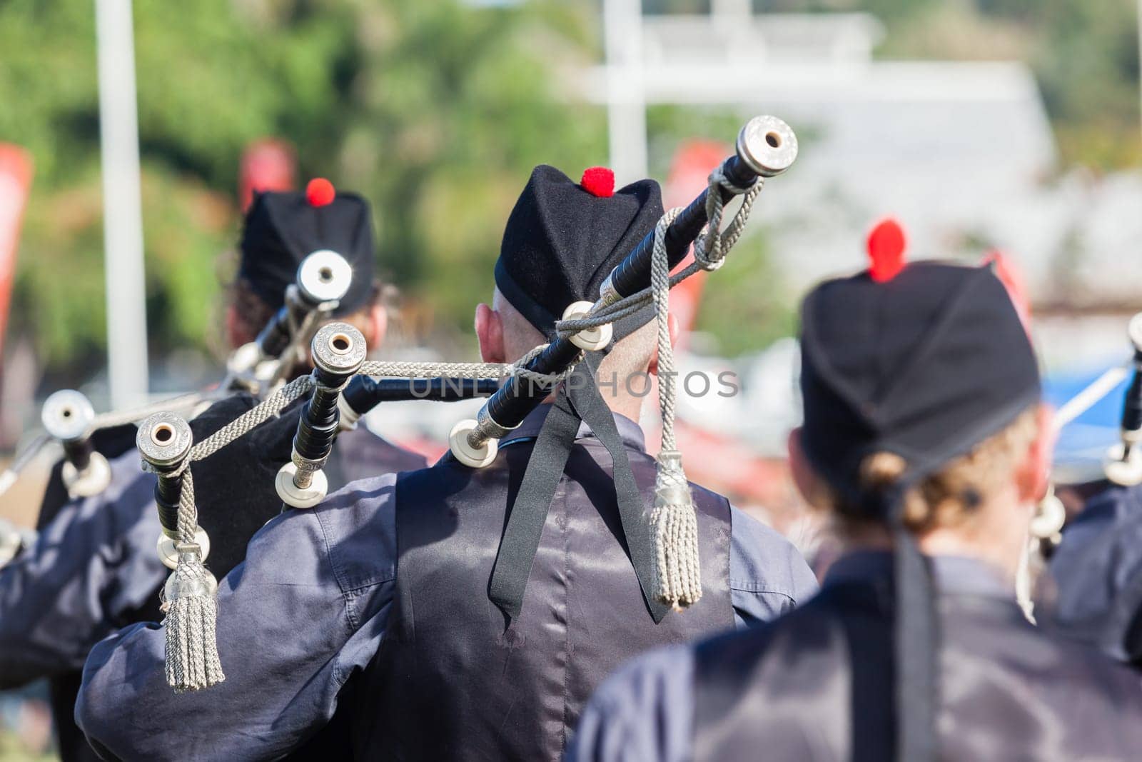 Scottish bands men and women play musical instruments in traditional Scottish clan colors dress at the Scottish Highland Gathering in Toti Durban South Africa