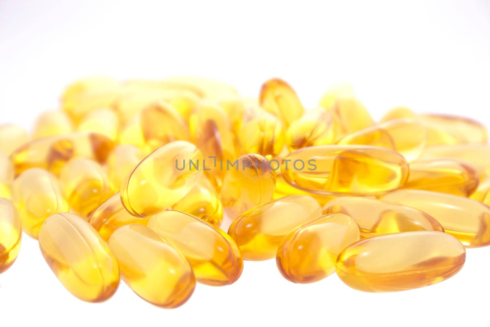 Cod liver oil omega 3 gel capsules isolated on white background