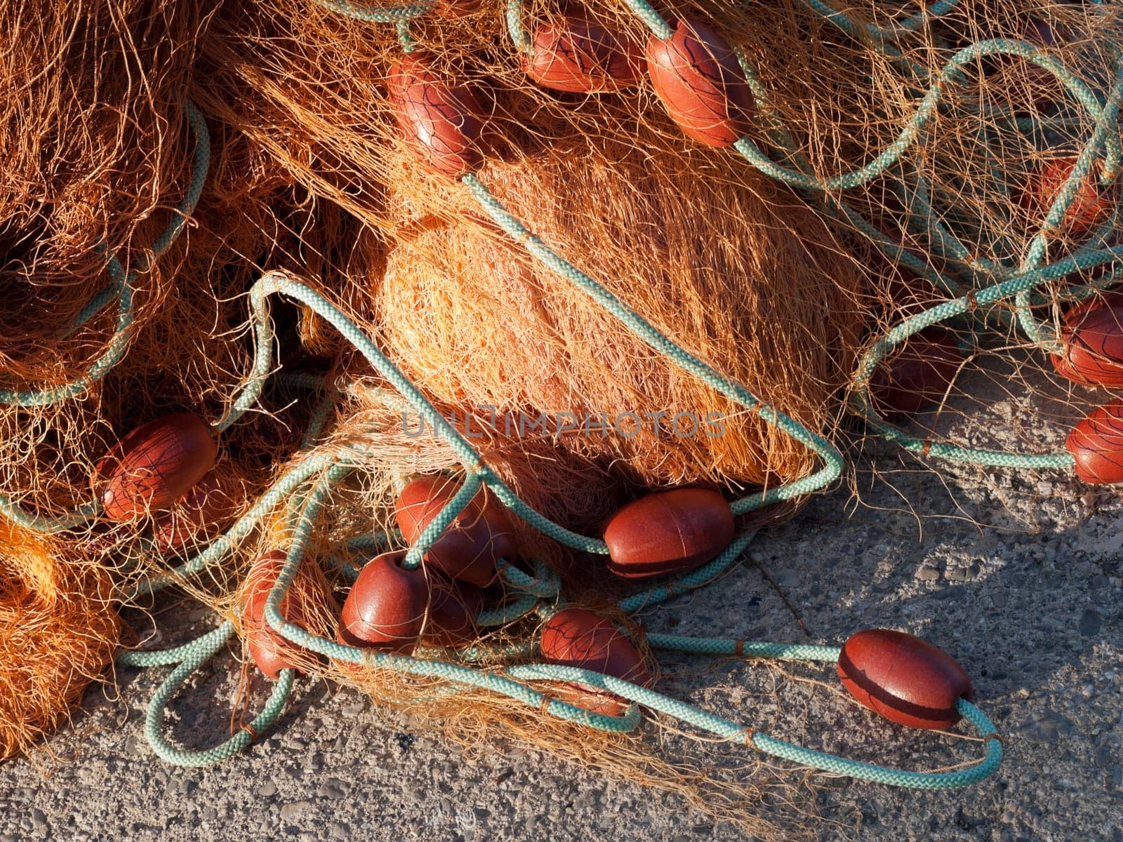 old fishing net with buoys in the port