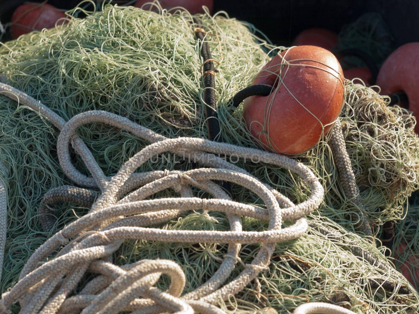 old fishing net with buoys in the port
