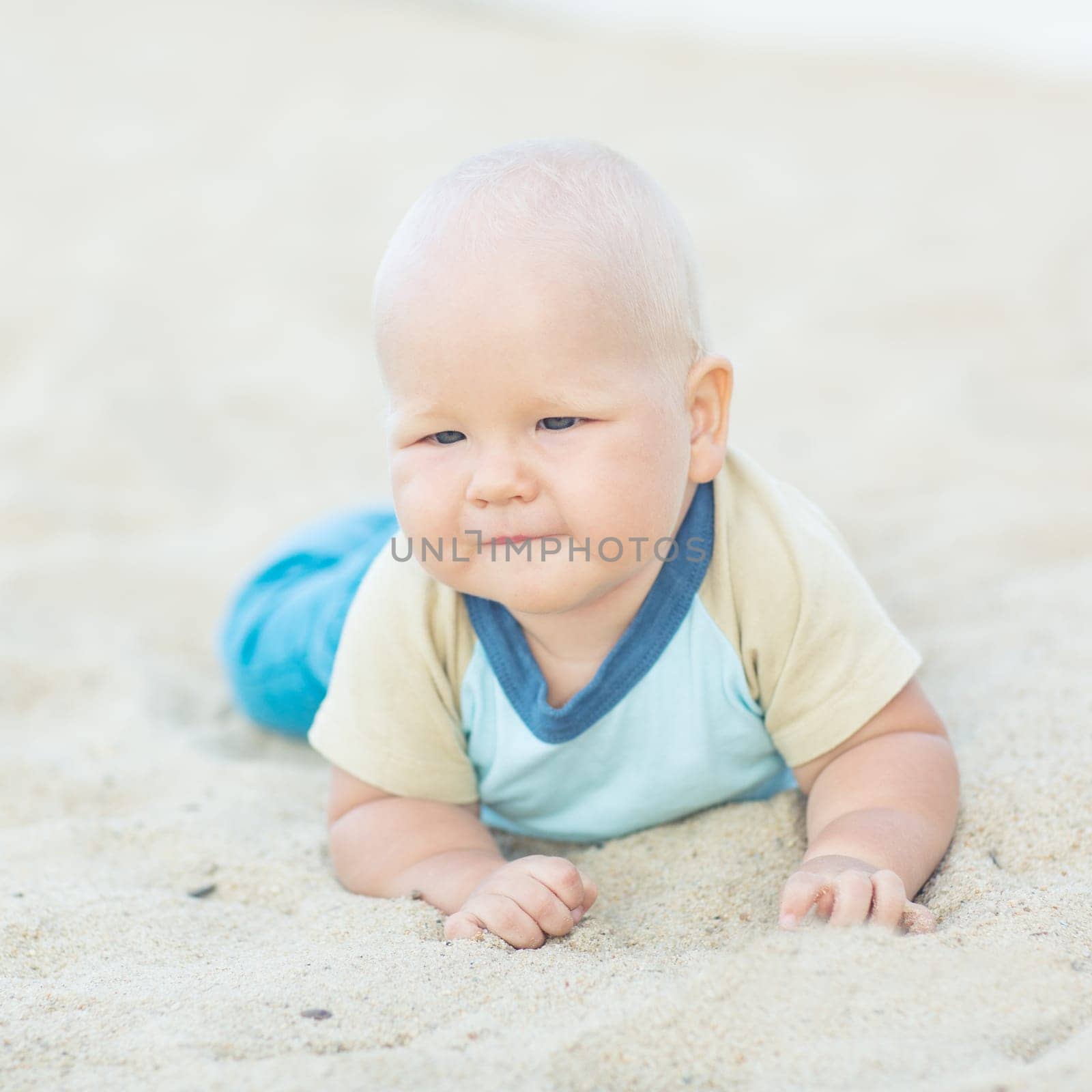 Cute baby on the tropical beach