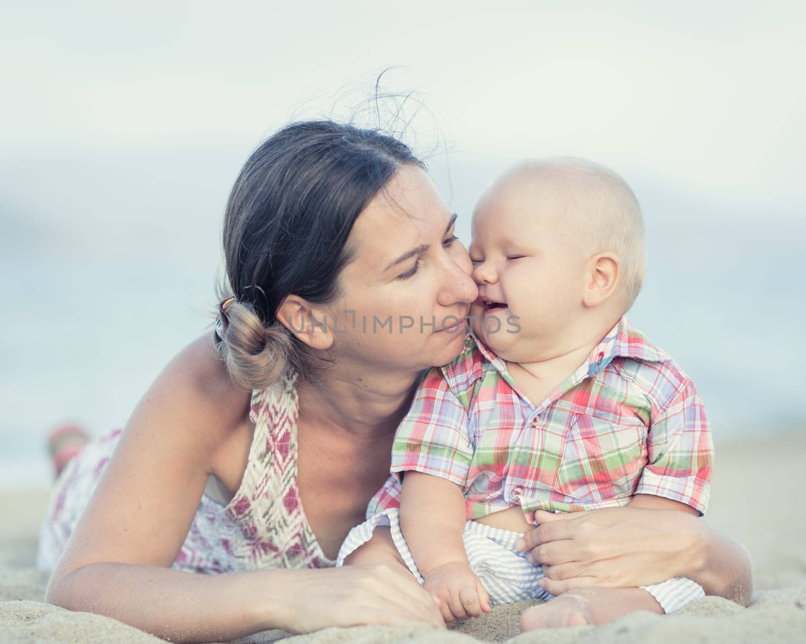 Baby and mother outdoor portrait