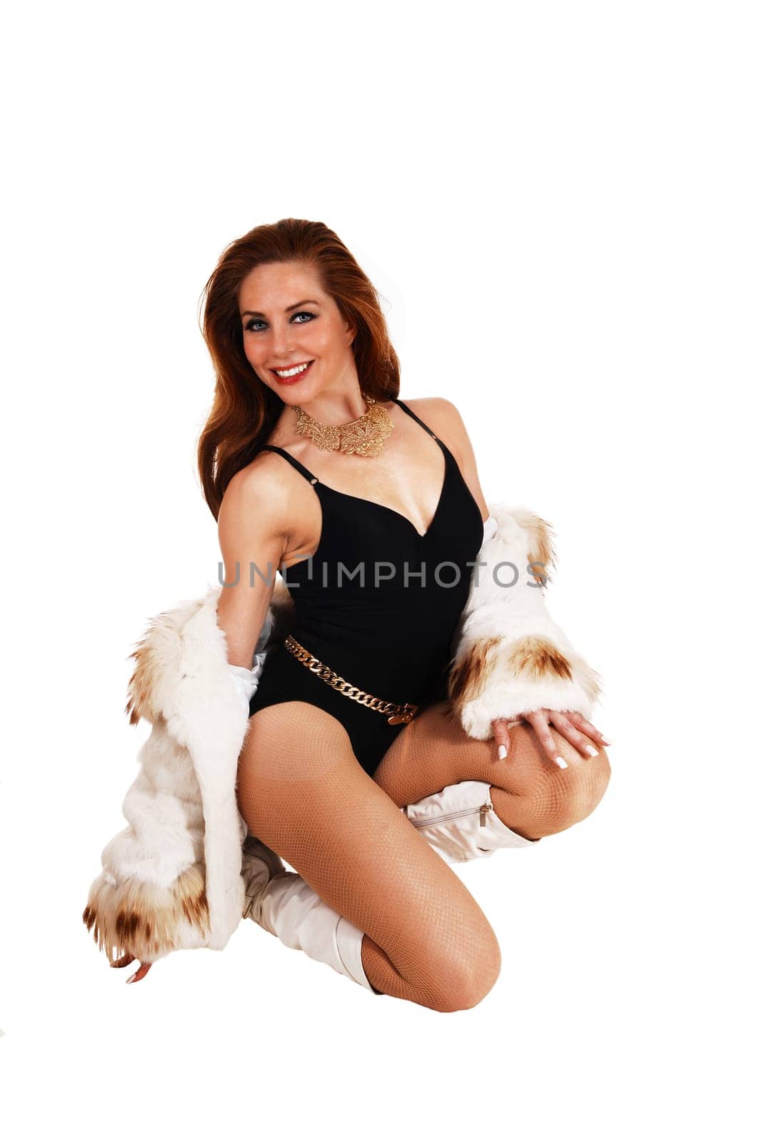 A woman in a black corset and white fur jacket is kneeling on the floor.isolated for white background...