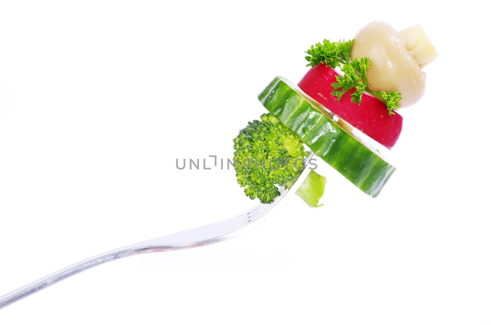 food on a fork isolated on white background