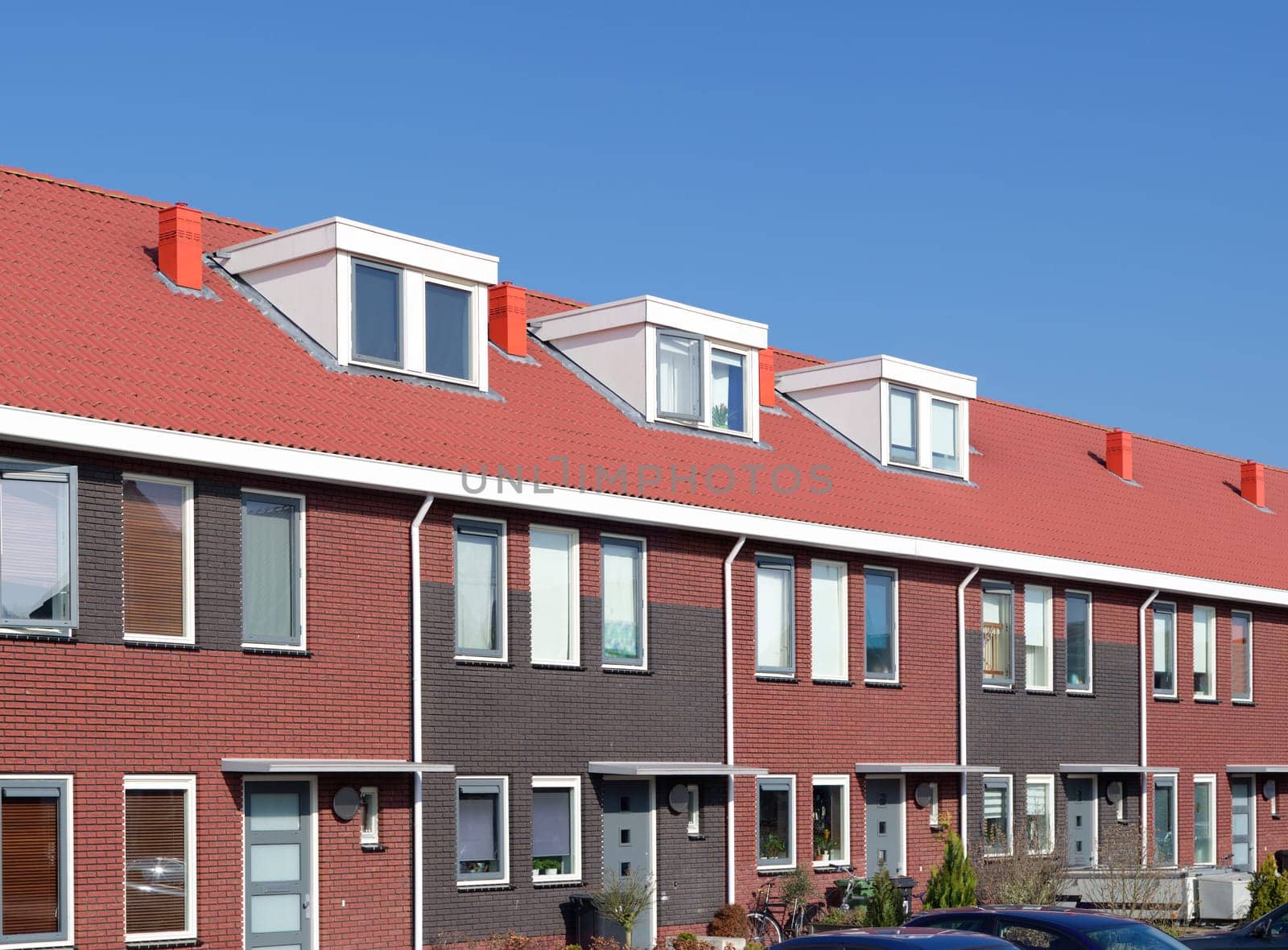 newly build terraced houses with dormer windows