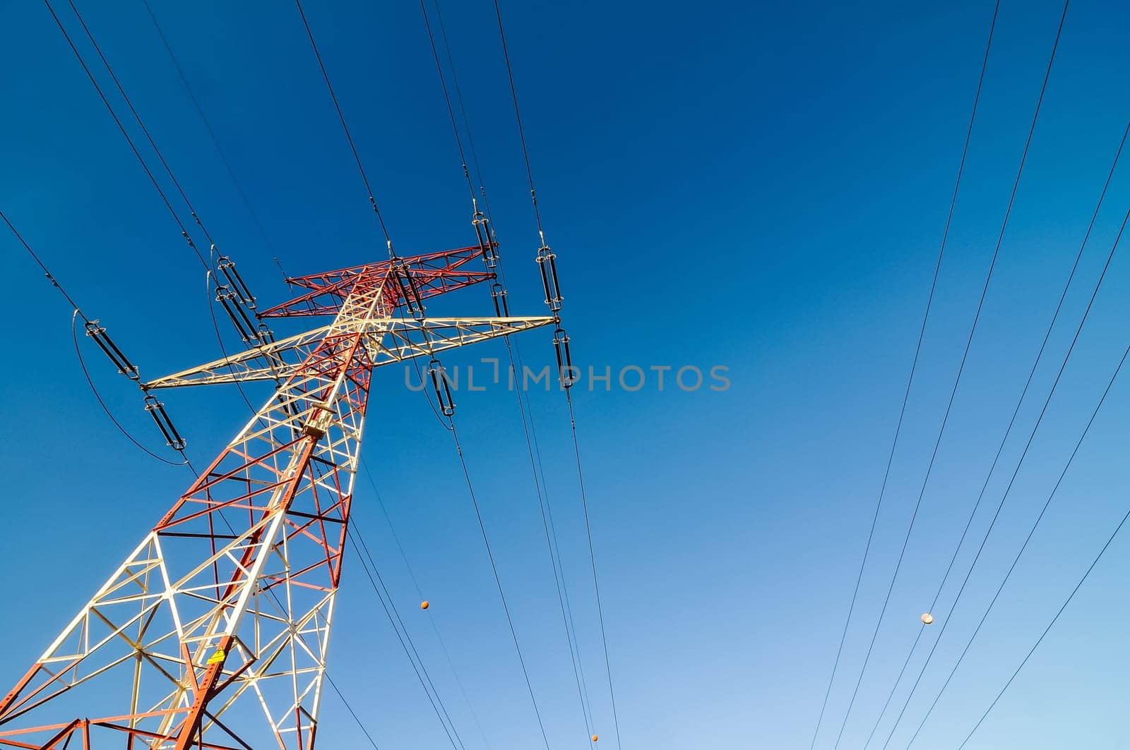Energy Electricity Power Pylon on a Blue Sky