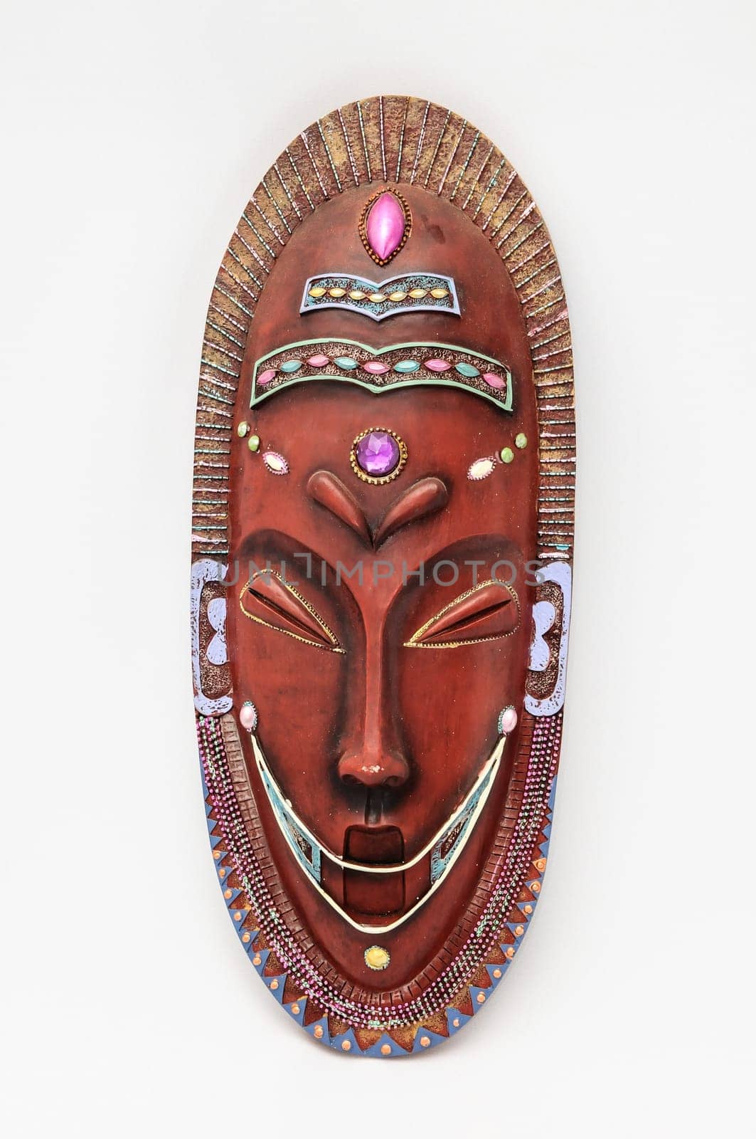 Wooden African Mask on a White Background