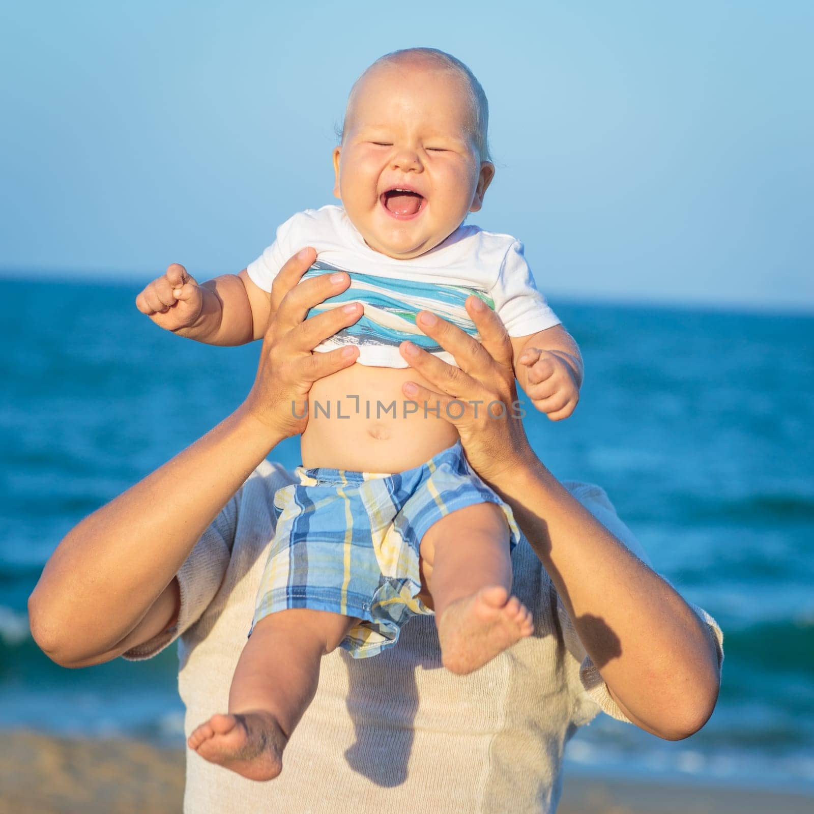 Baby and father having fun time