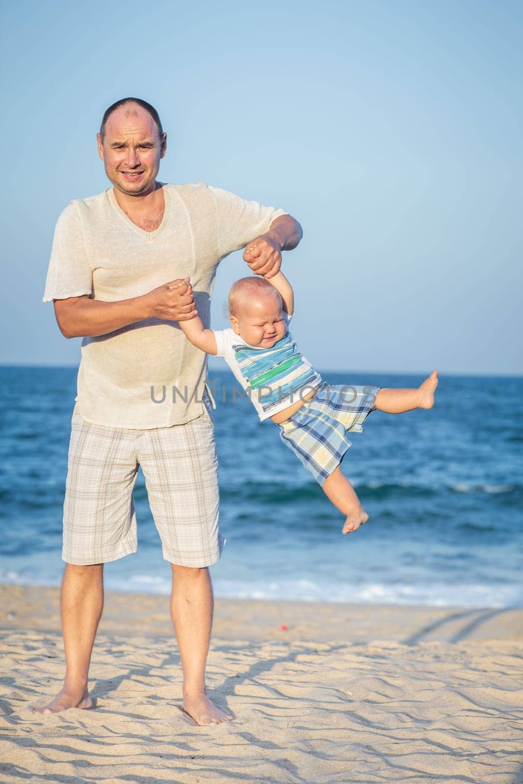 Baby and father having fun time