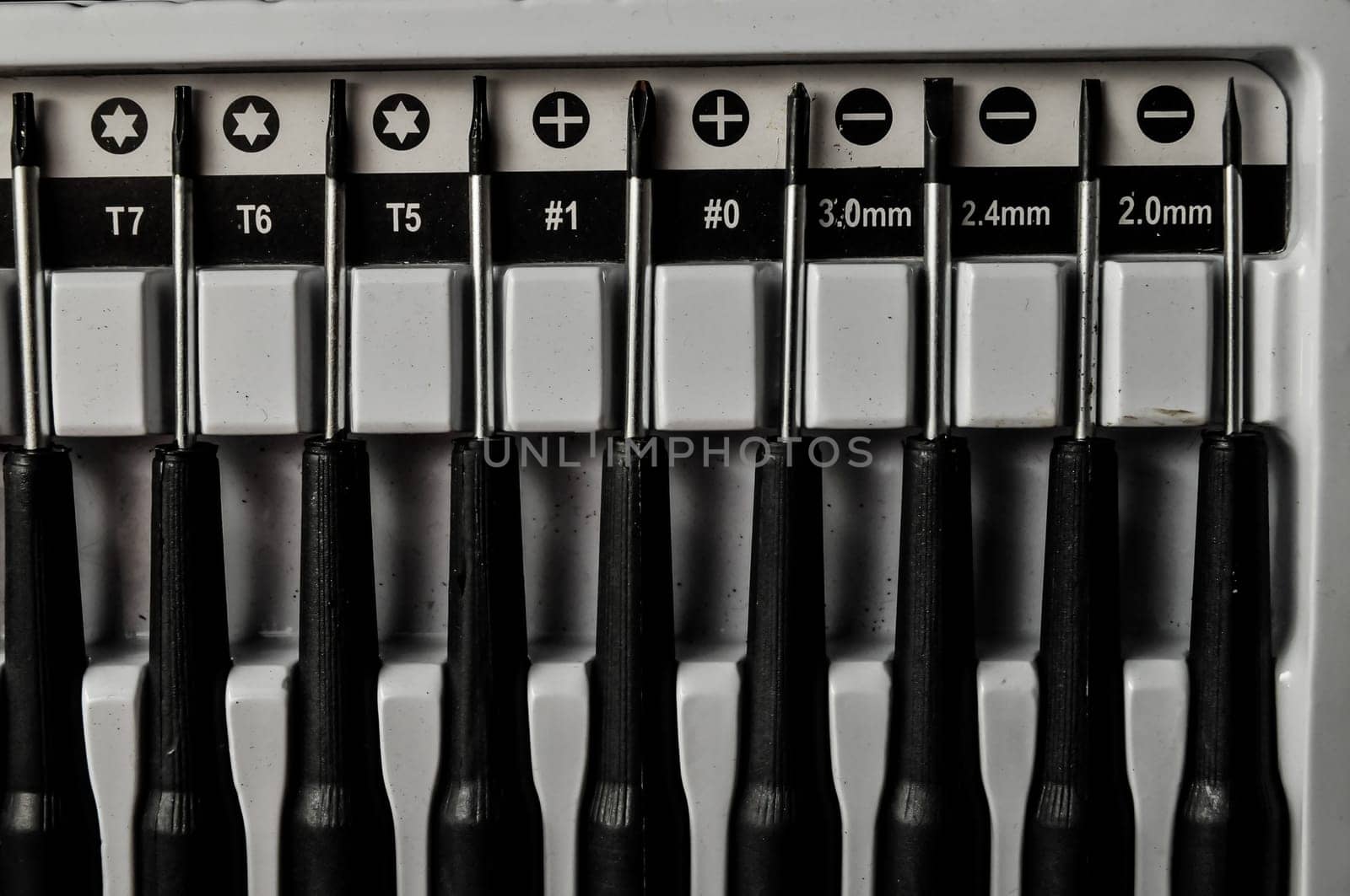 A set of screwdriver on a black background
