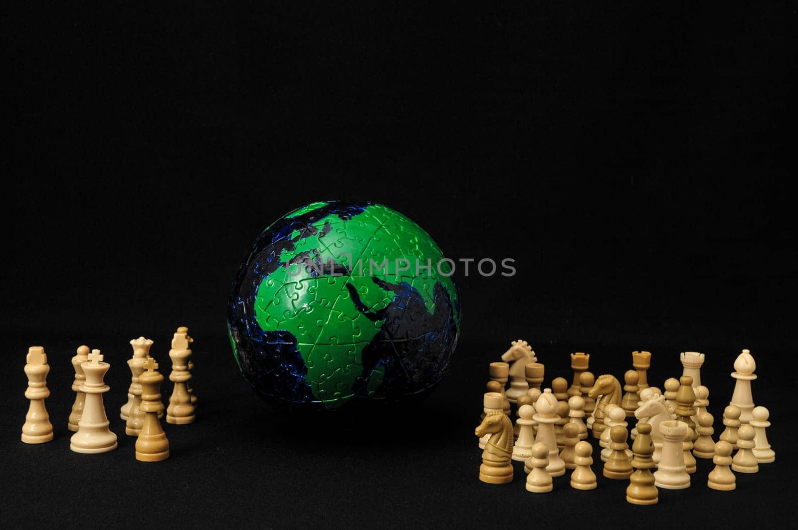 Globe And White Chess on a Black Background