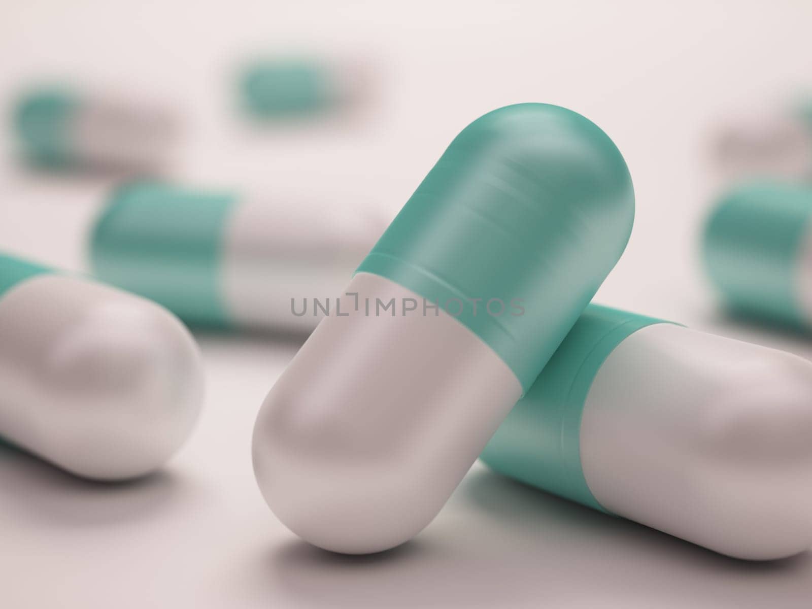 Pills scattered over white background with depth of view.