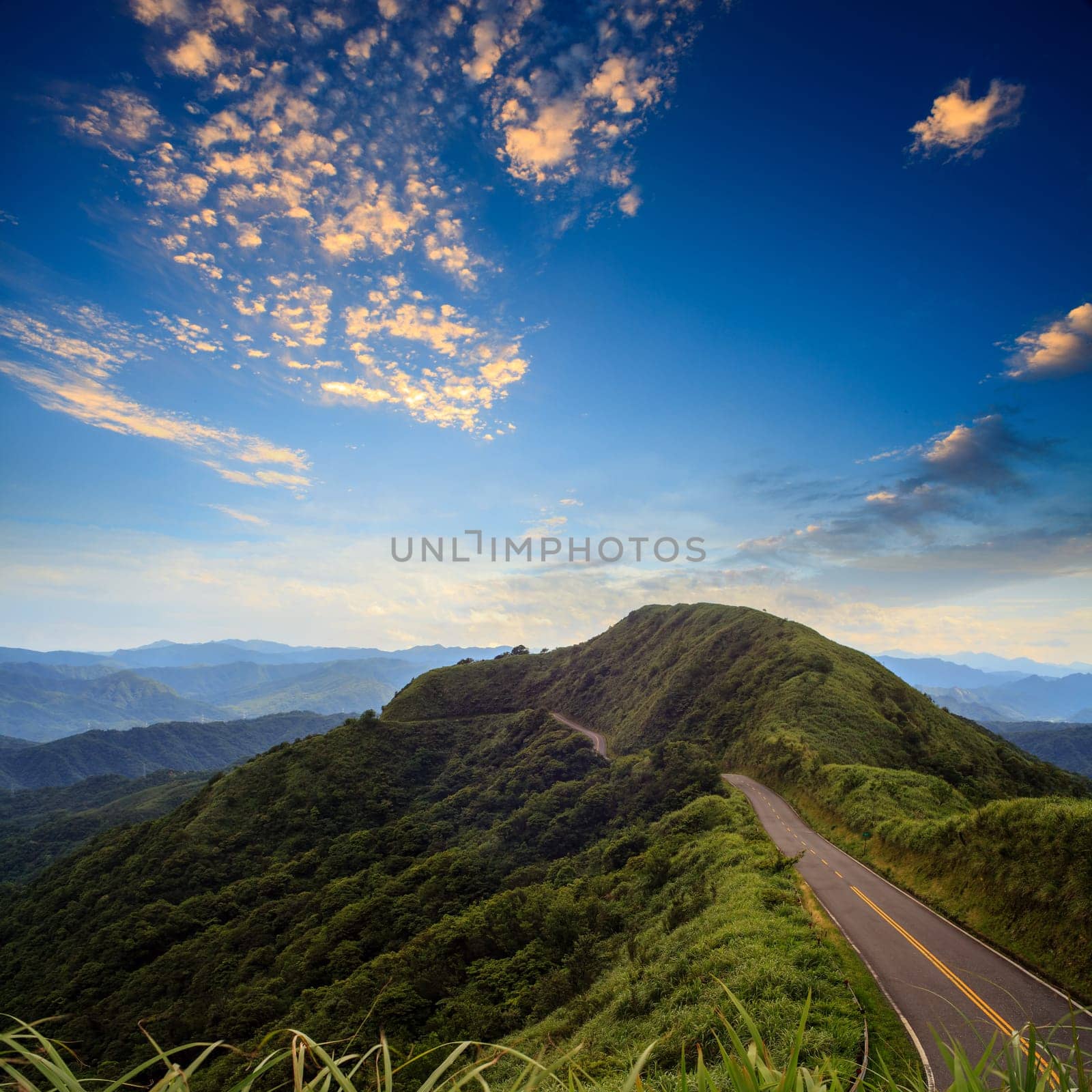 beautiful mountain road with nice sky for adv or others purpose use