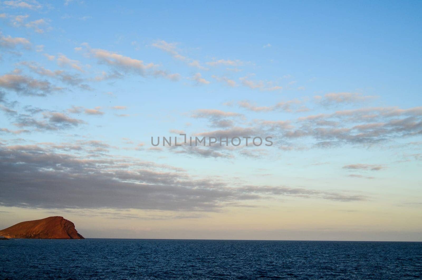 Cloudscape, Colored Clouds at Sunset near the Ocean