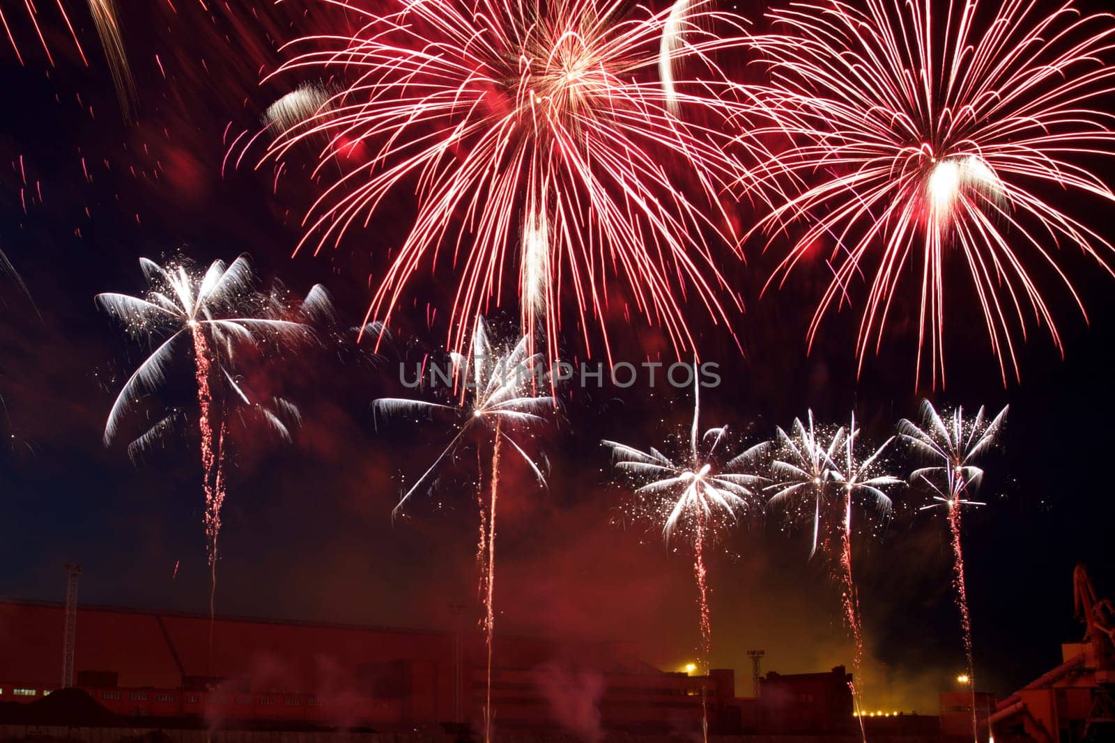colorful balls of fireworks in a night sky