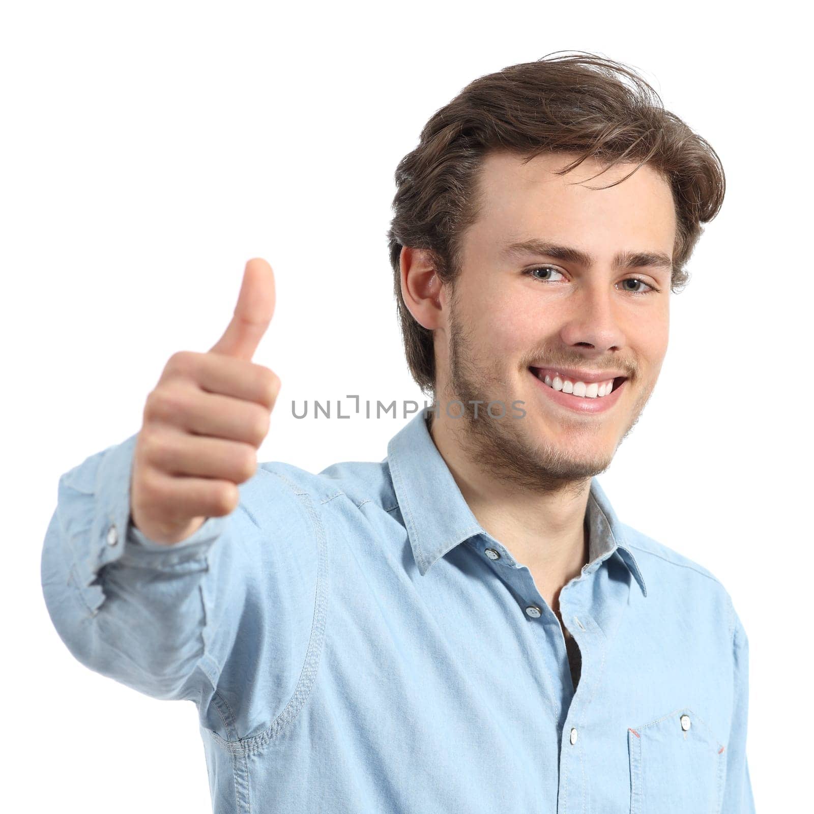Happy man with white teeth smiling with thumbs up isolated on a white background