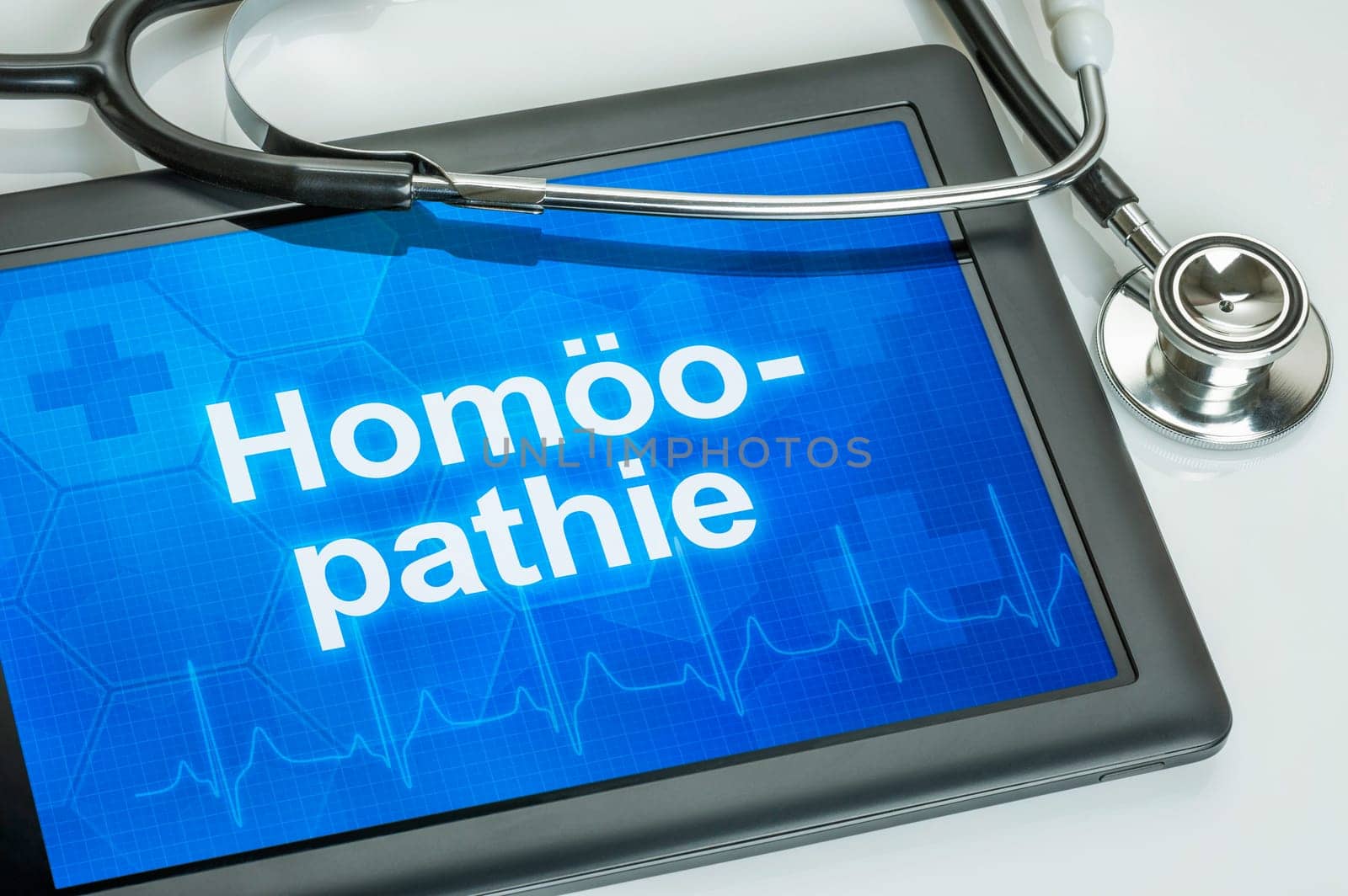 Tablet with the text homeopathy on the display