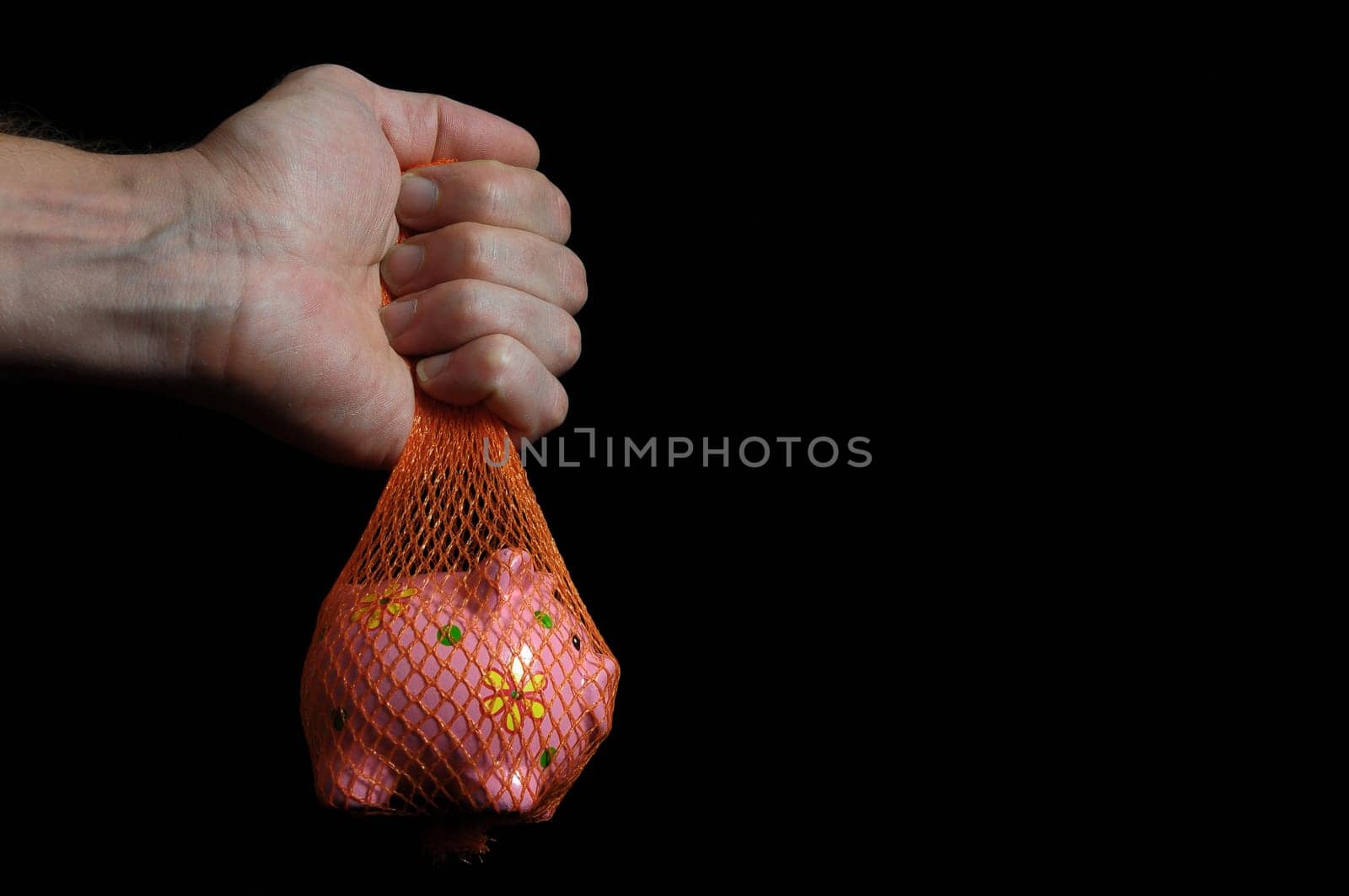 Trapped Money And an Hand on a Black Background