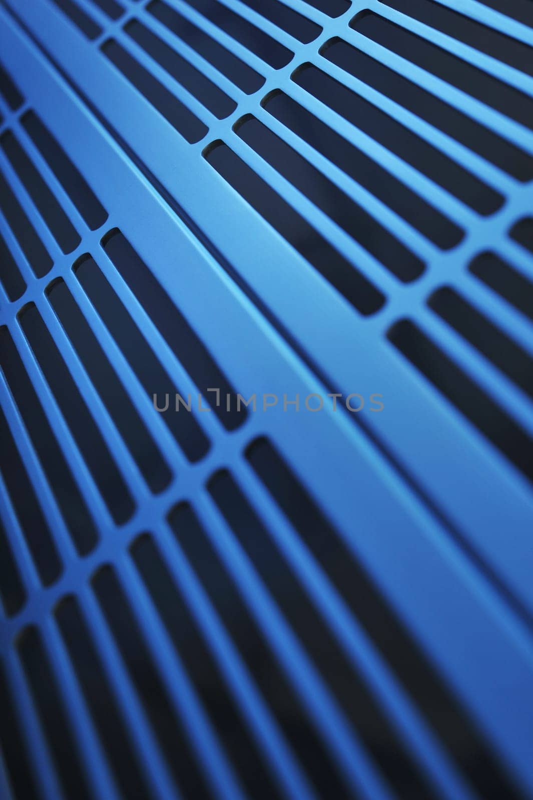 abstract industrial background made of aluminium ventilation grilles