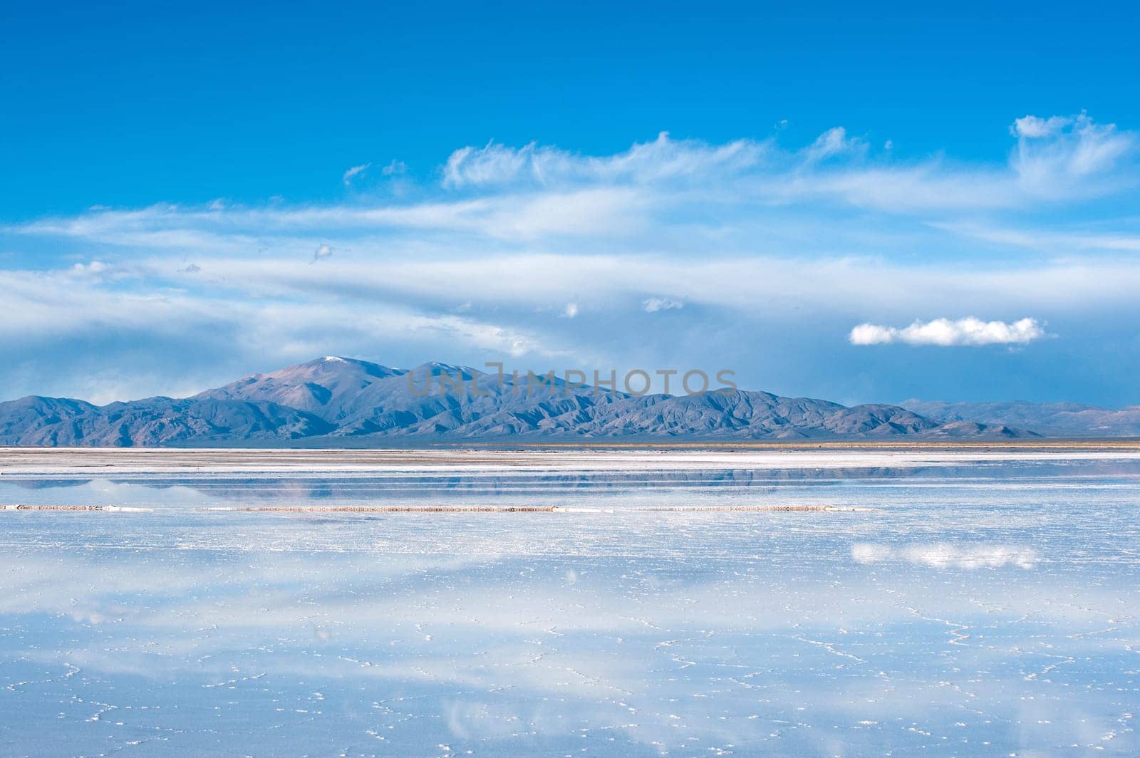 Salinas Grandes on Argentina Andes is a salt desert in the Jujuy Province..It is of industrial importance for its sodium and potassium mines. More significantly, Bolivas Salar de Uyuni is also located in the same region and is estimated to contain up to 80% of the worlds lithium deposits.