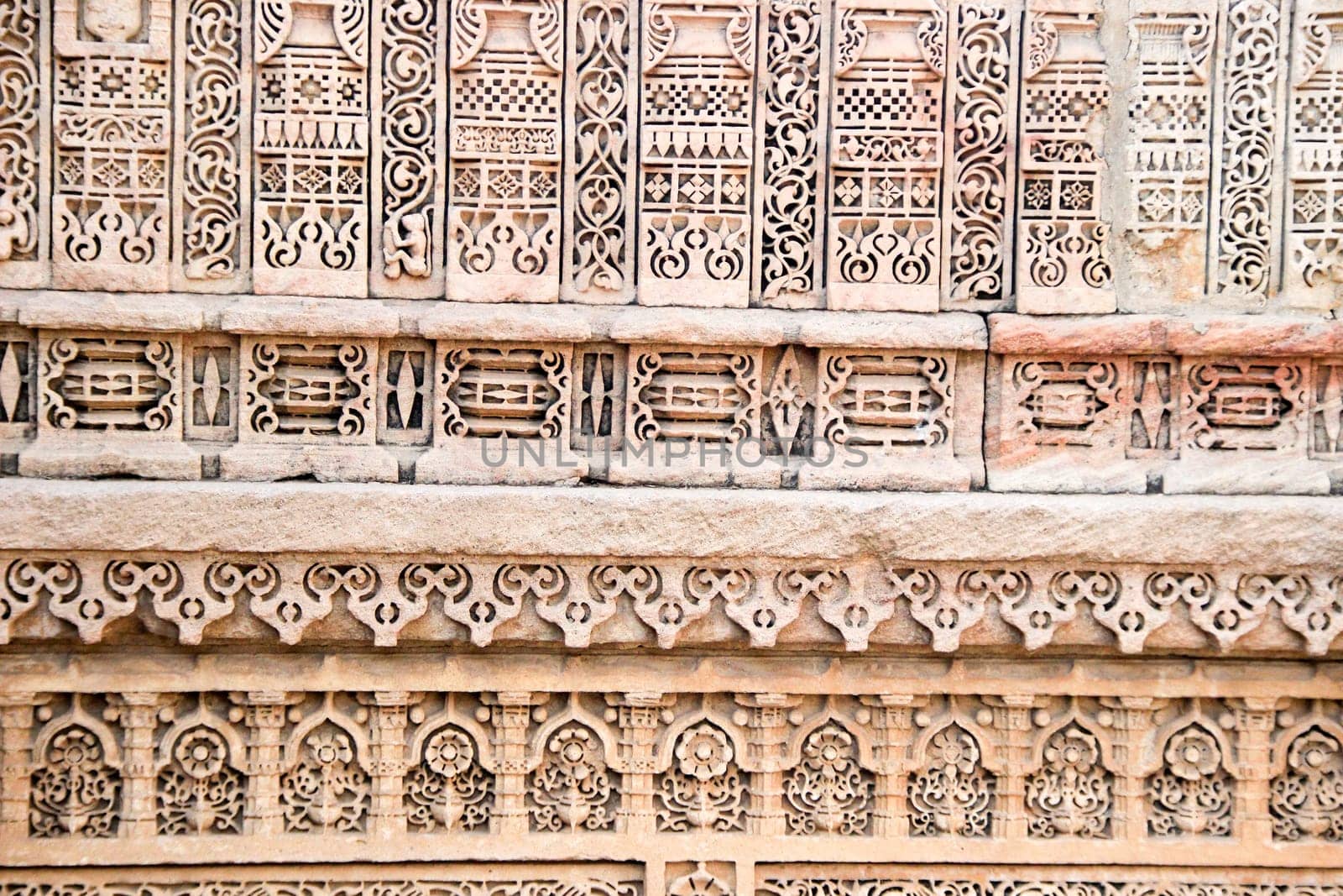 Beautiful, intricate, miniature carving on wall at Adalaj Step Well, Ahmedabad, Gujarat, India, Asia
