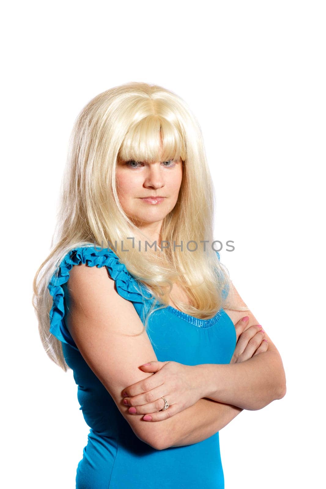 a serious woman with long blonde hair on a white background
