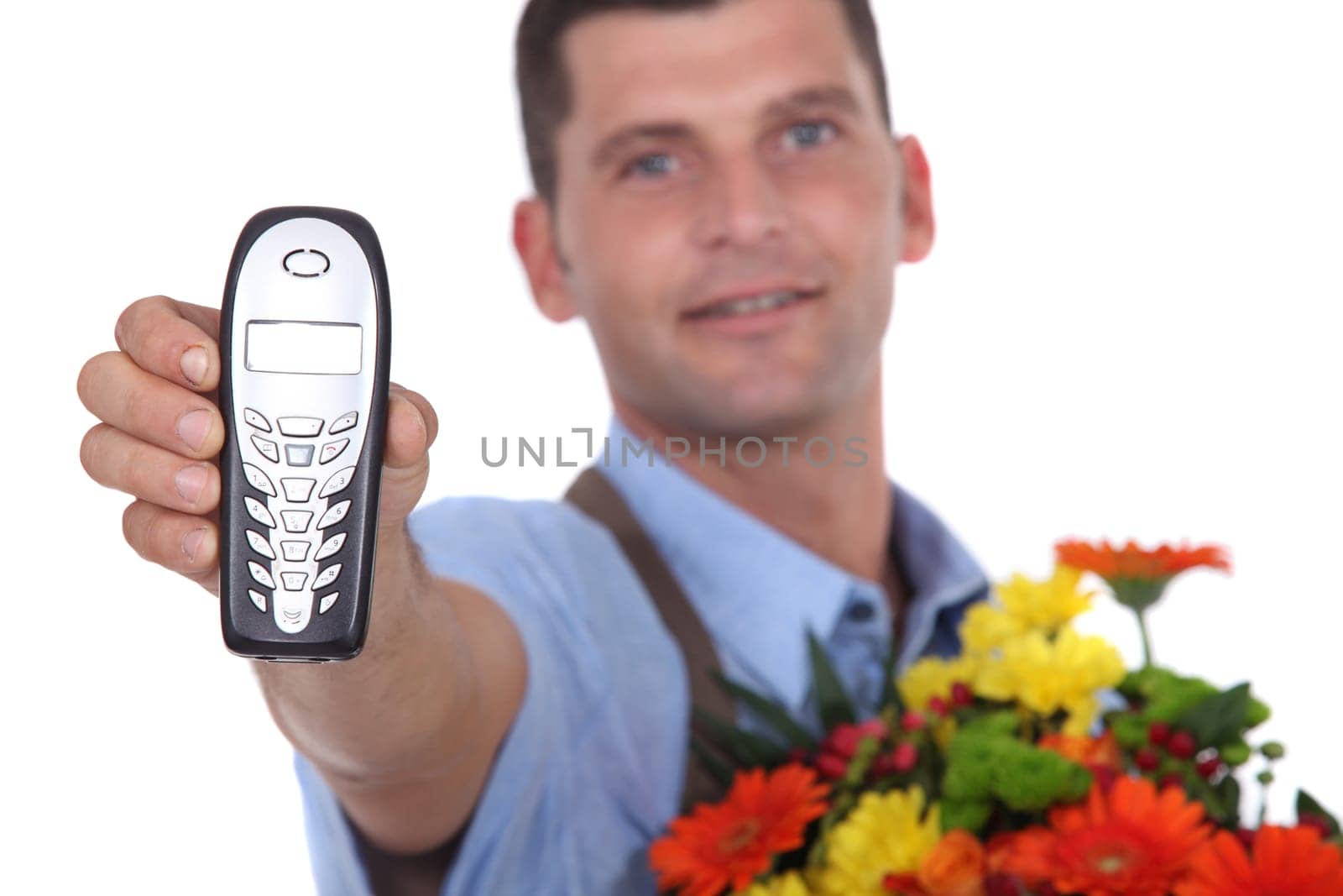 Florist holding forth a telephone