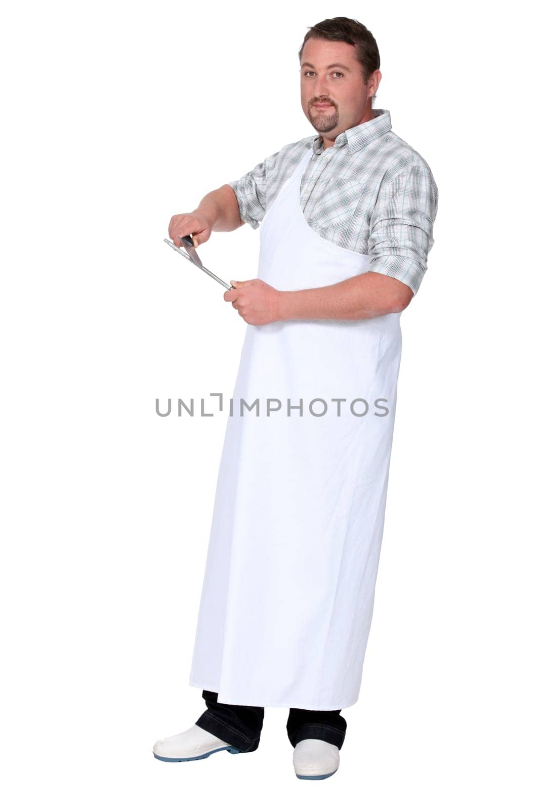 Man sharpening knife