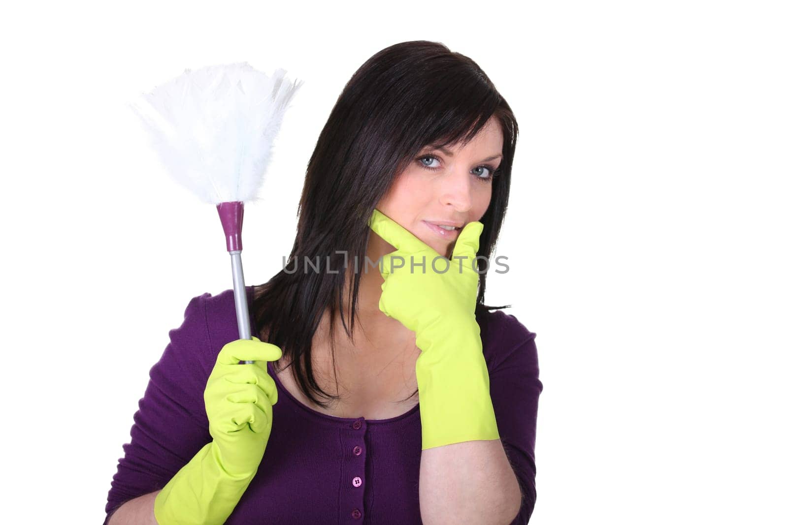 A maid with a feather duster