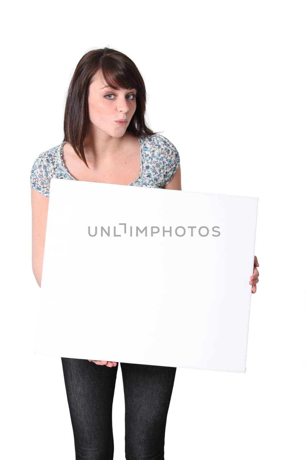 Young woman with a blank board