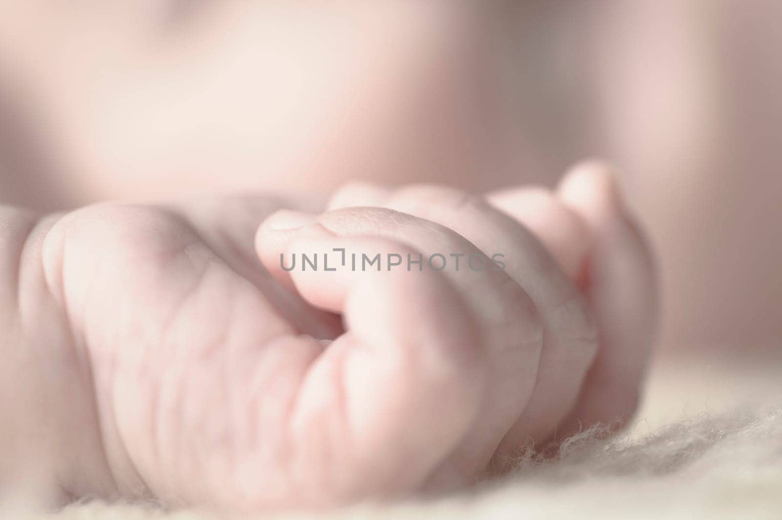 Close up of baby girls' sweet little hand and fingers
