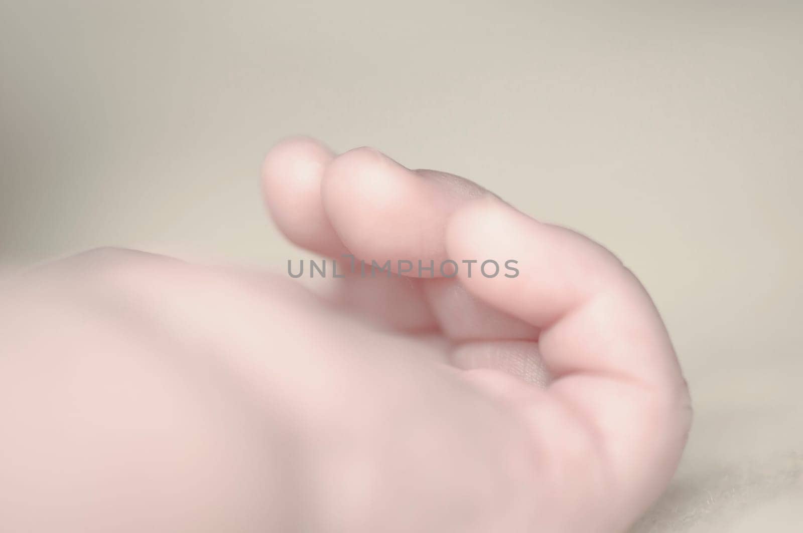 Close up of baby girls' sweet little hand and fingers