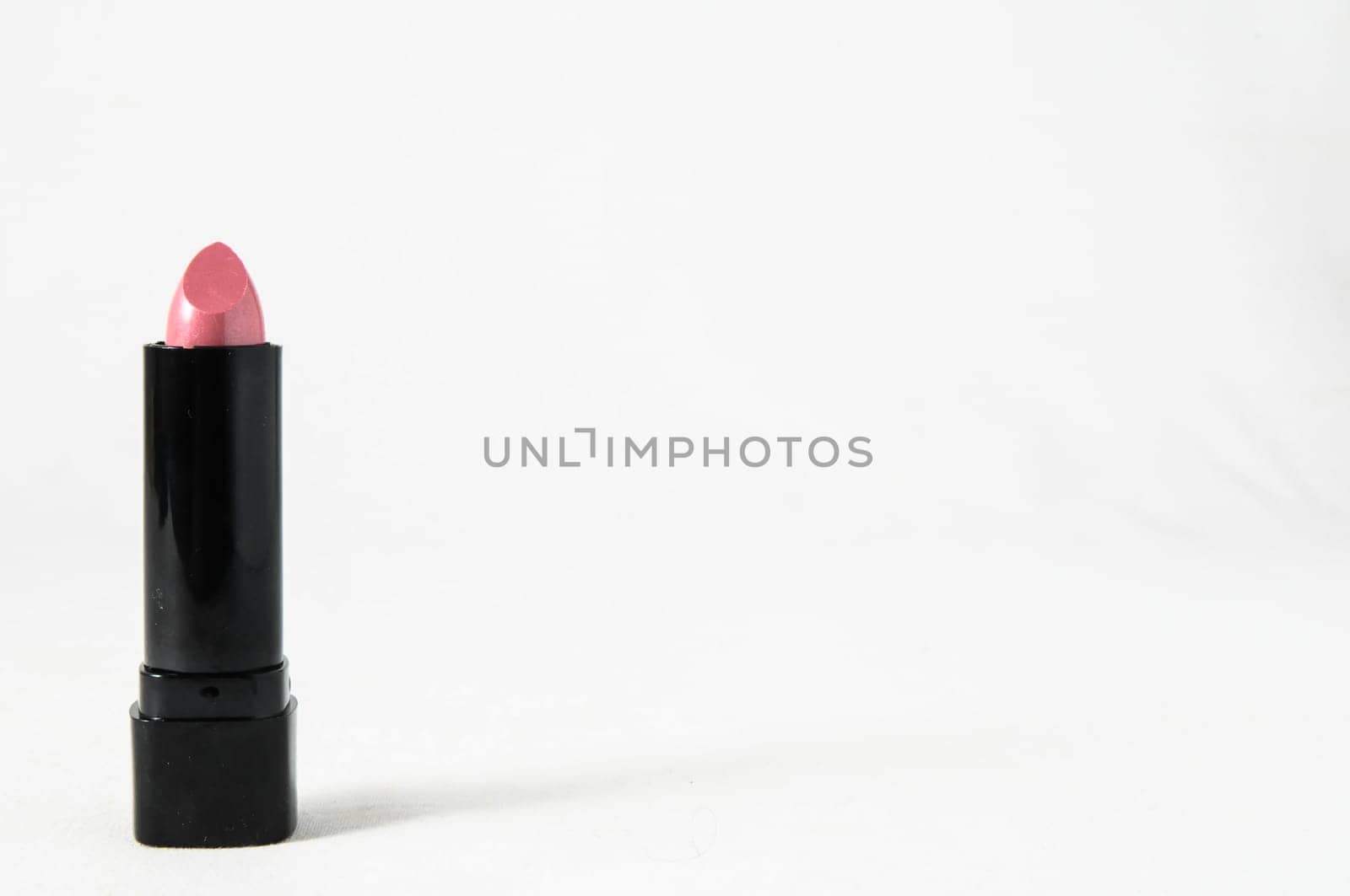 Lipstick in Black Container on a white background