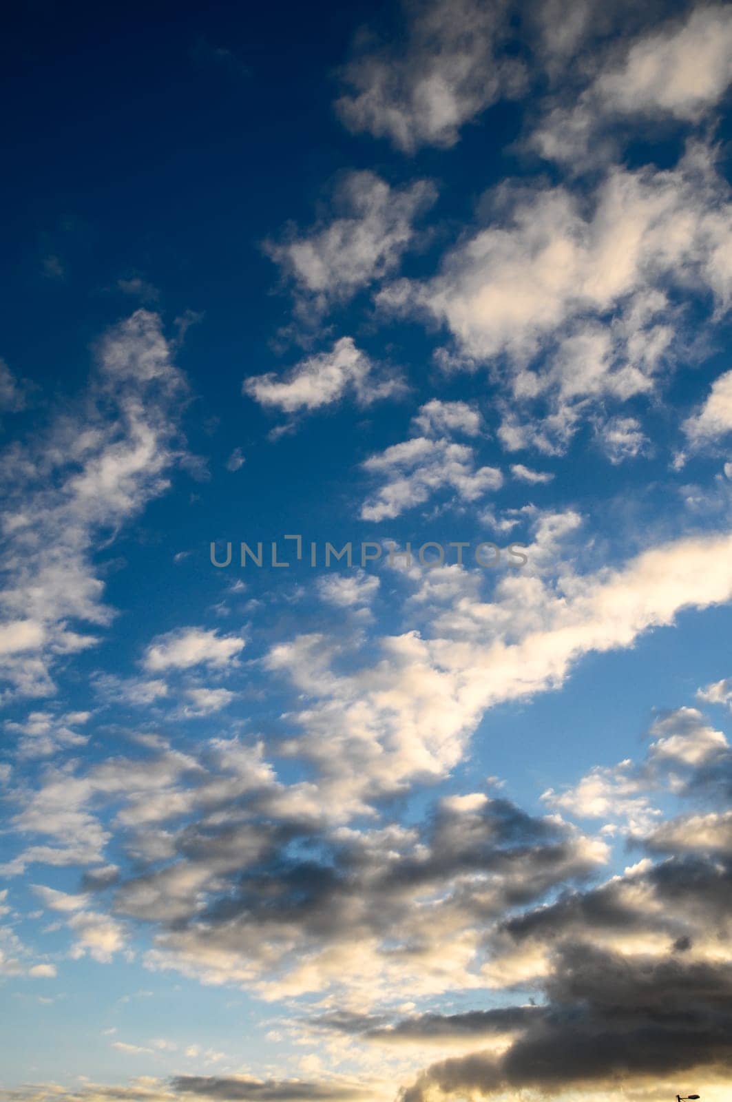 Cloudscape, Colored Clouds at Sunset near the Ocean