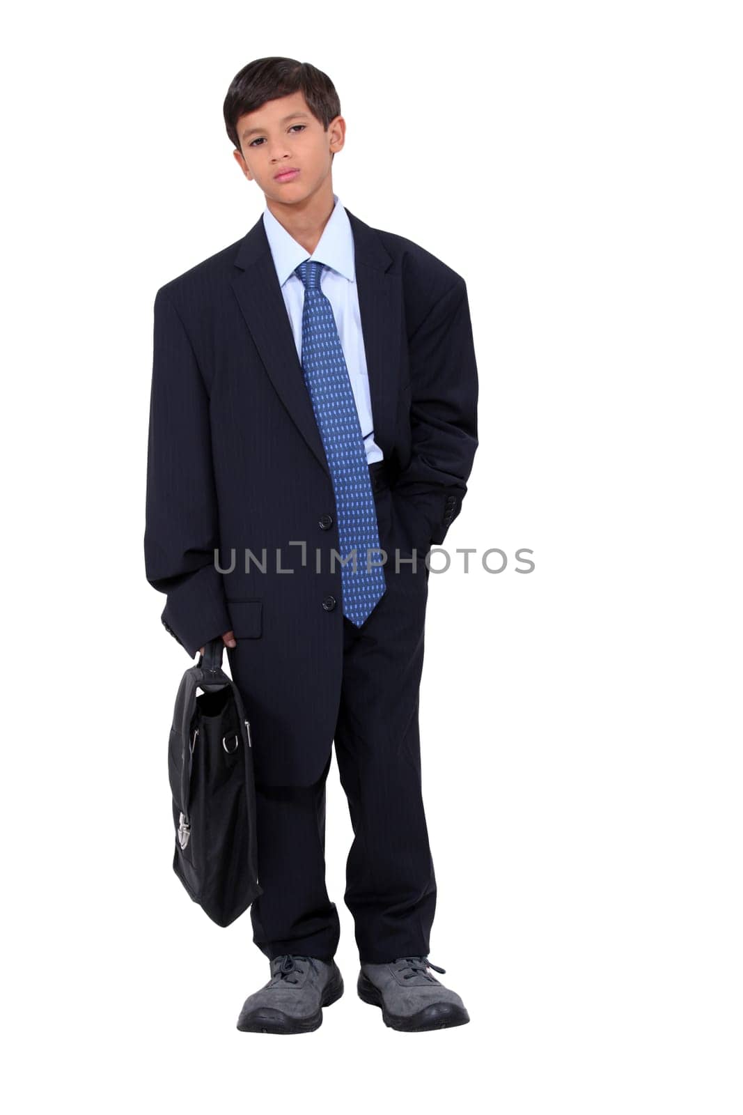 Little boy dressed as businessman