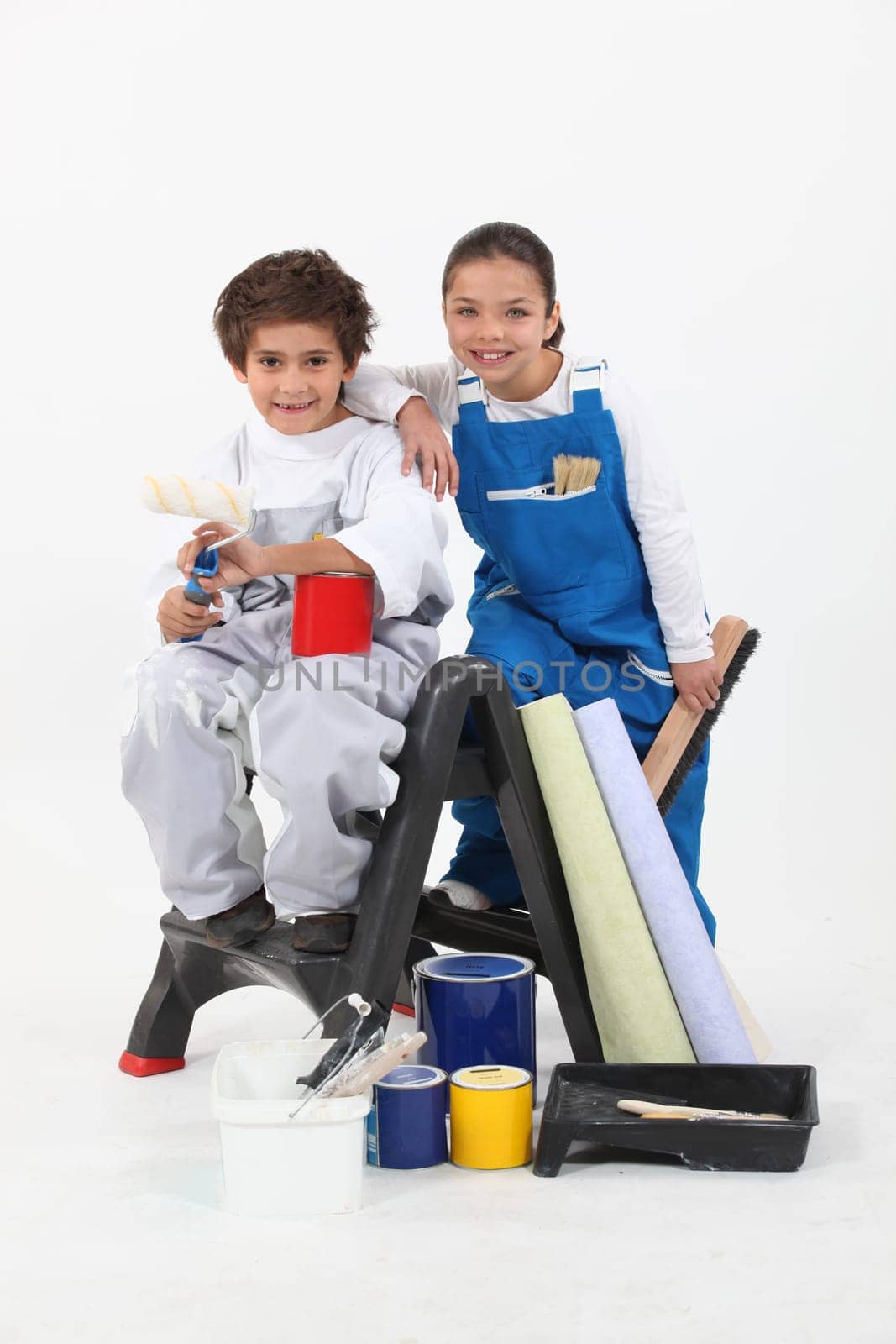 Children with paint cans