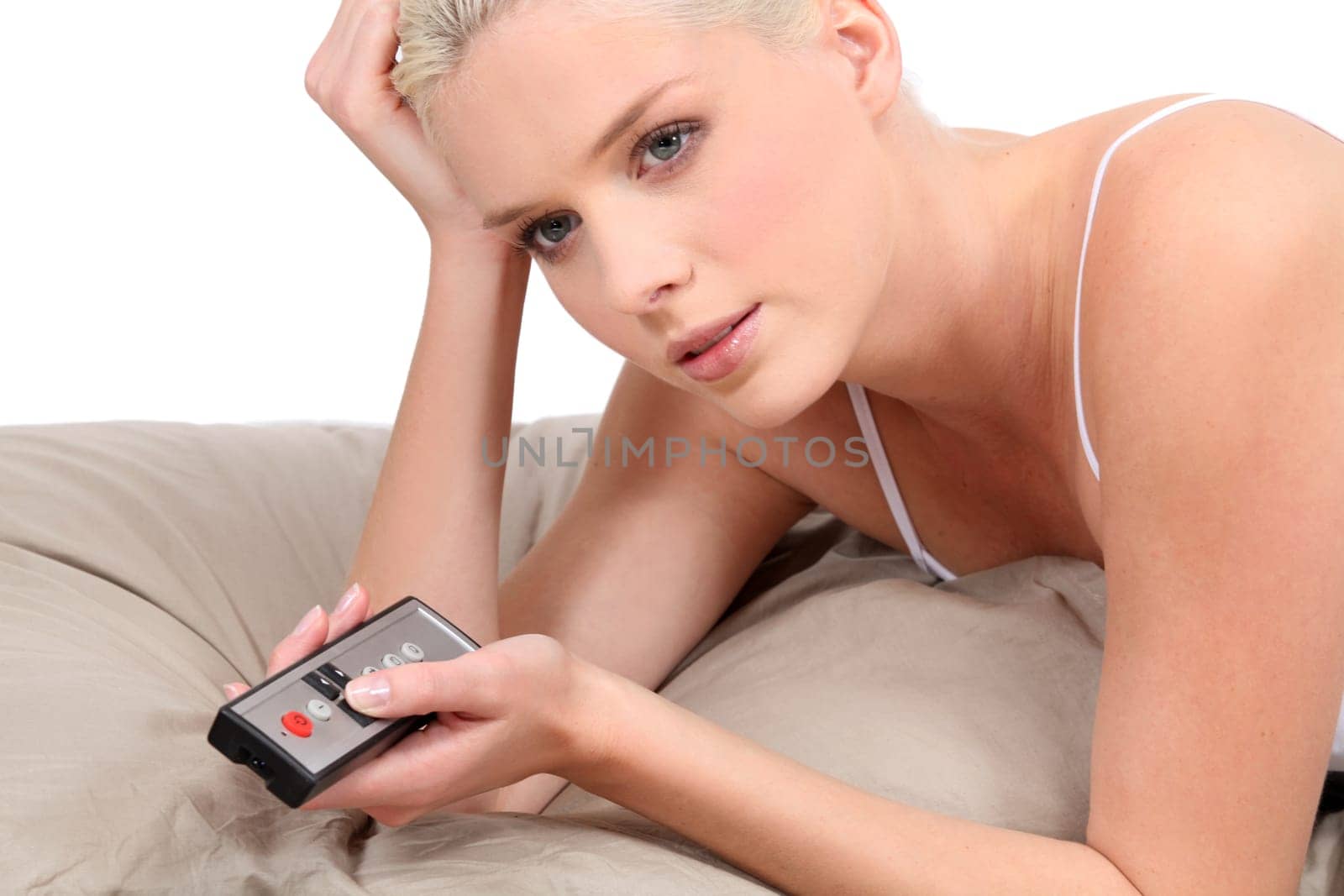 Young blonde with remote control