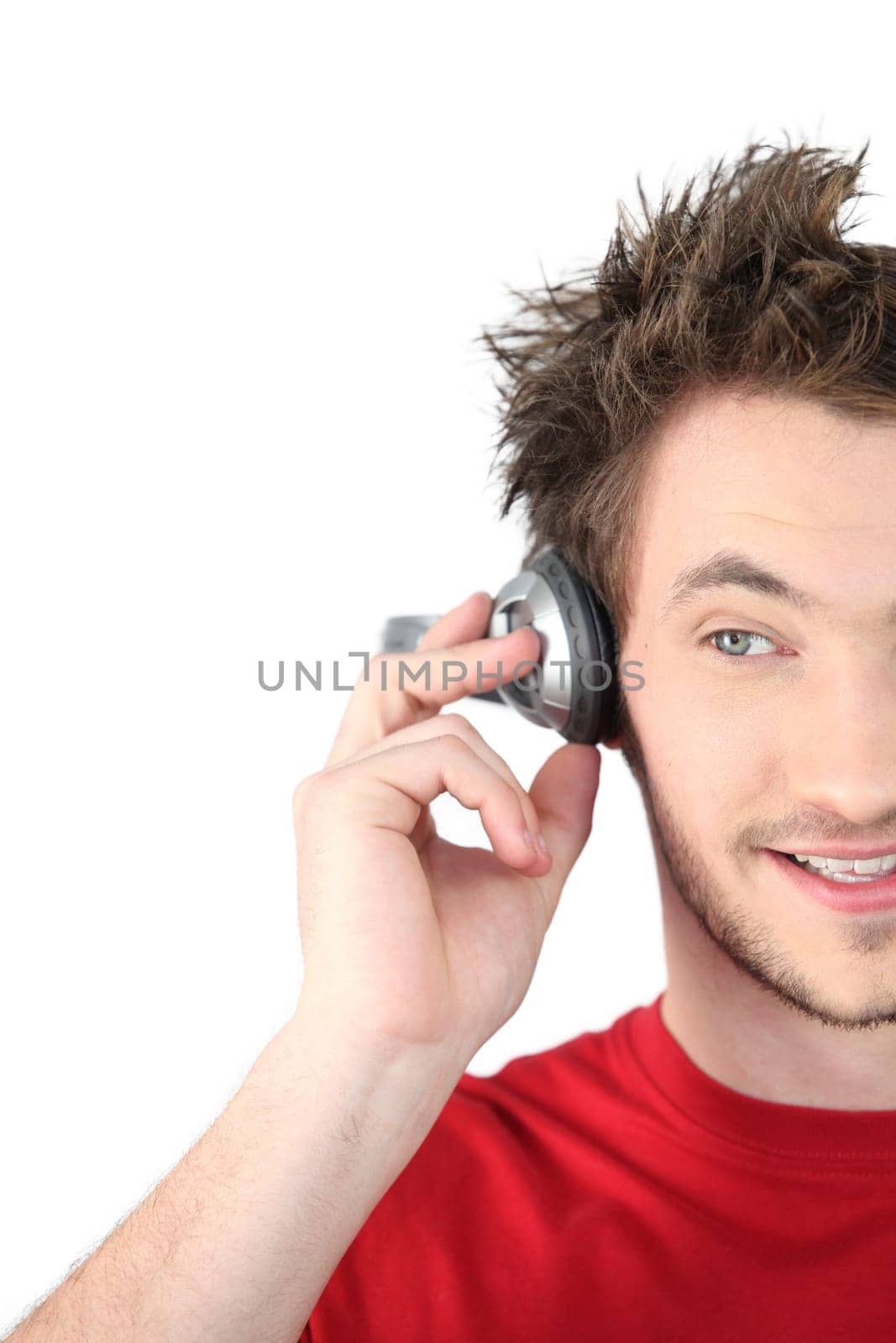 Man listening to music through headphones