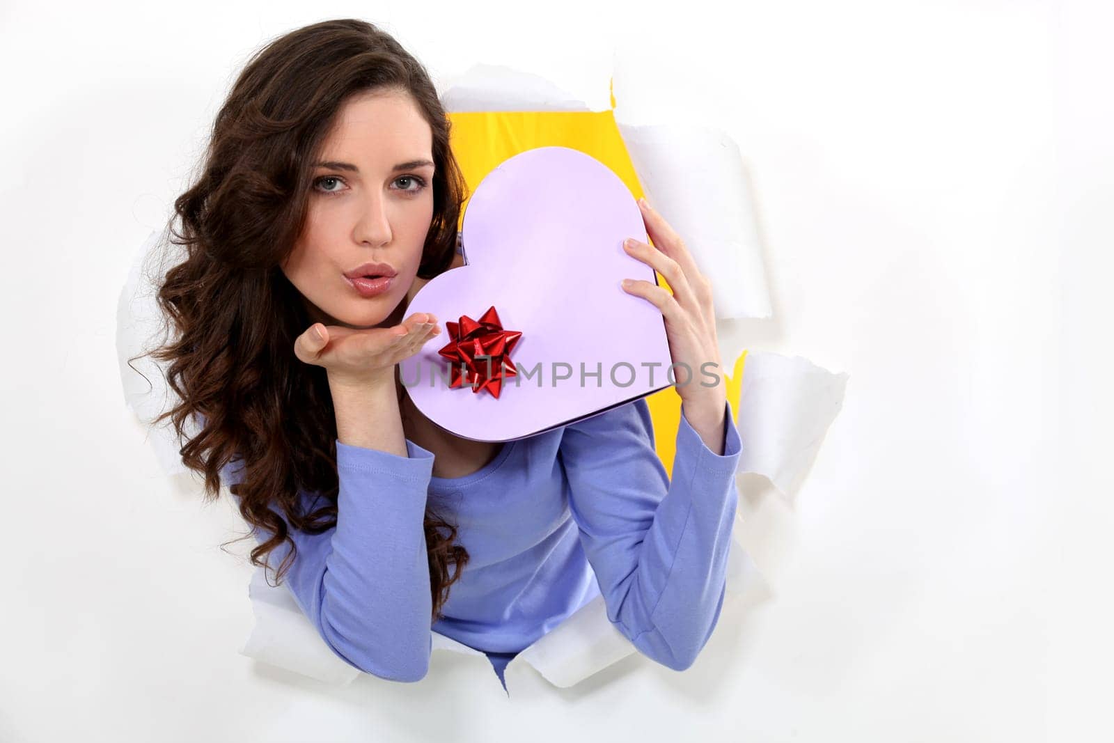 Woman with heart shaped box