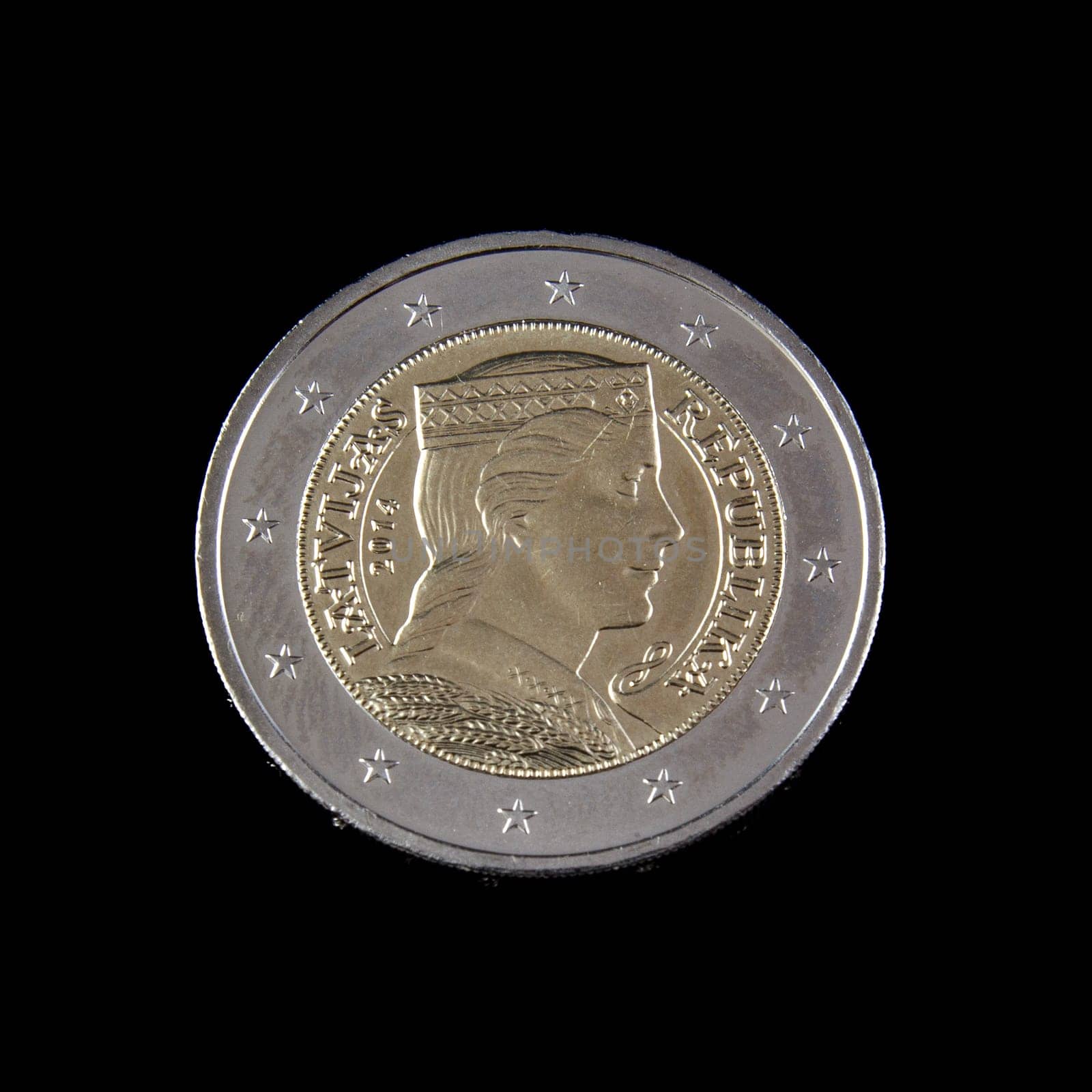 Latvia EURO on black background. Latvia replaced its previous currency, the lats, with the euro on 1 January 2014