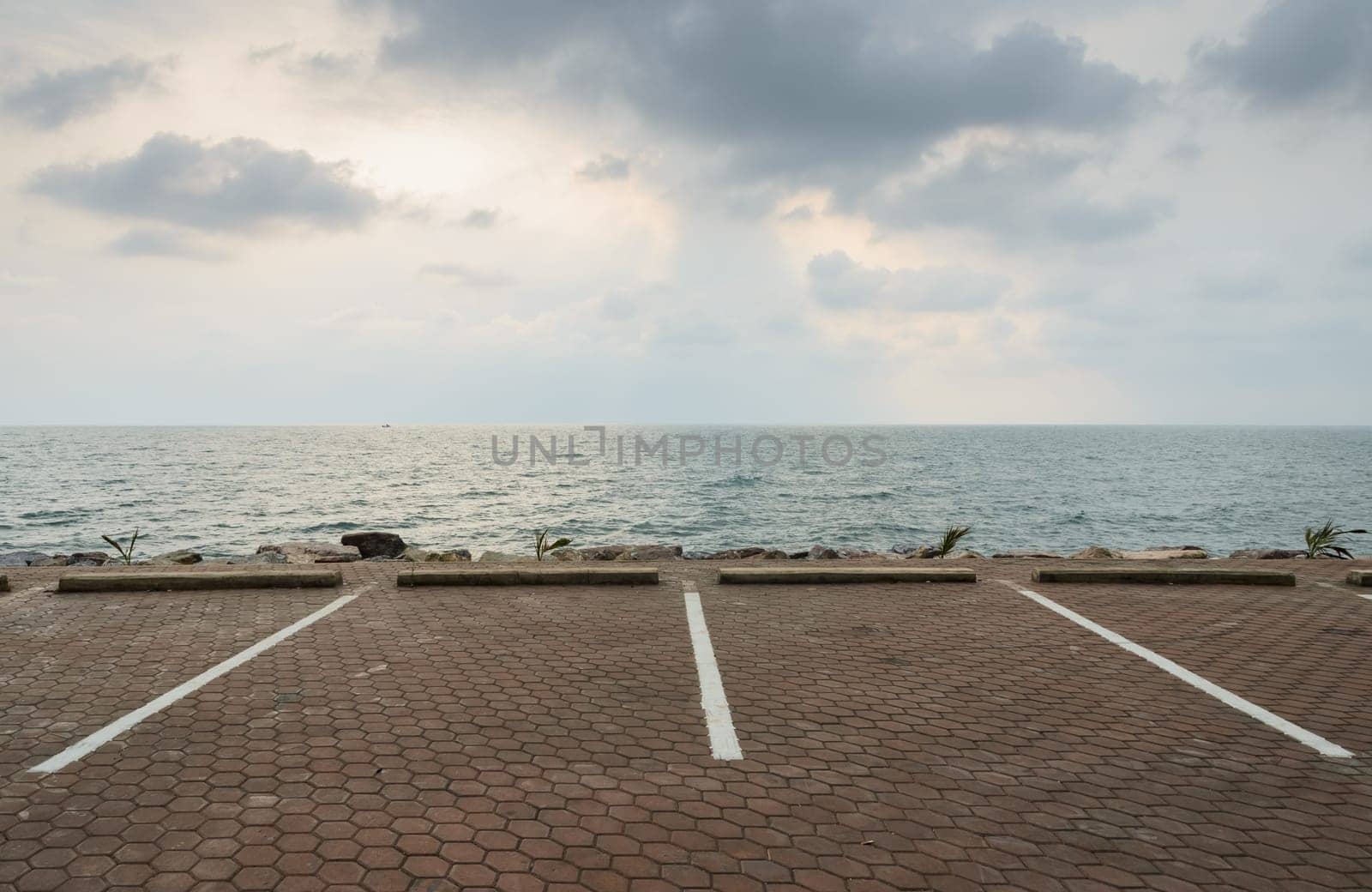 Empty parking lot with seascape