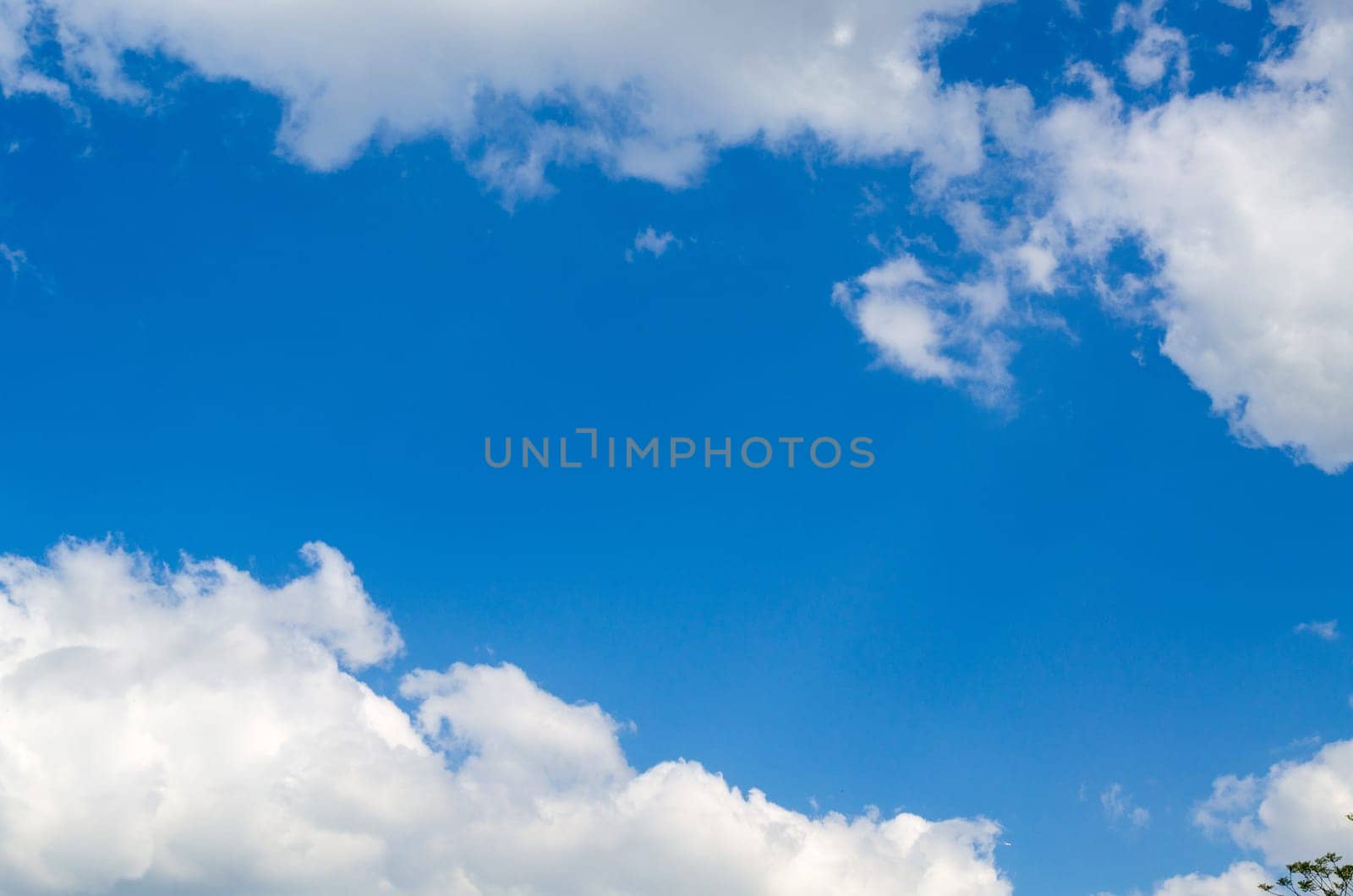 Beautiful blue spring sky with white clouds.
