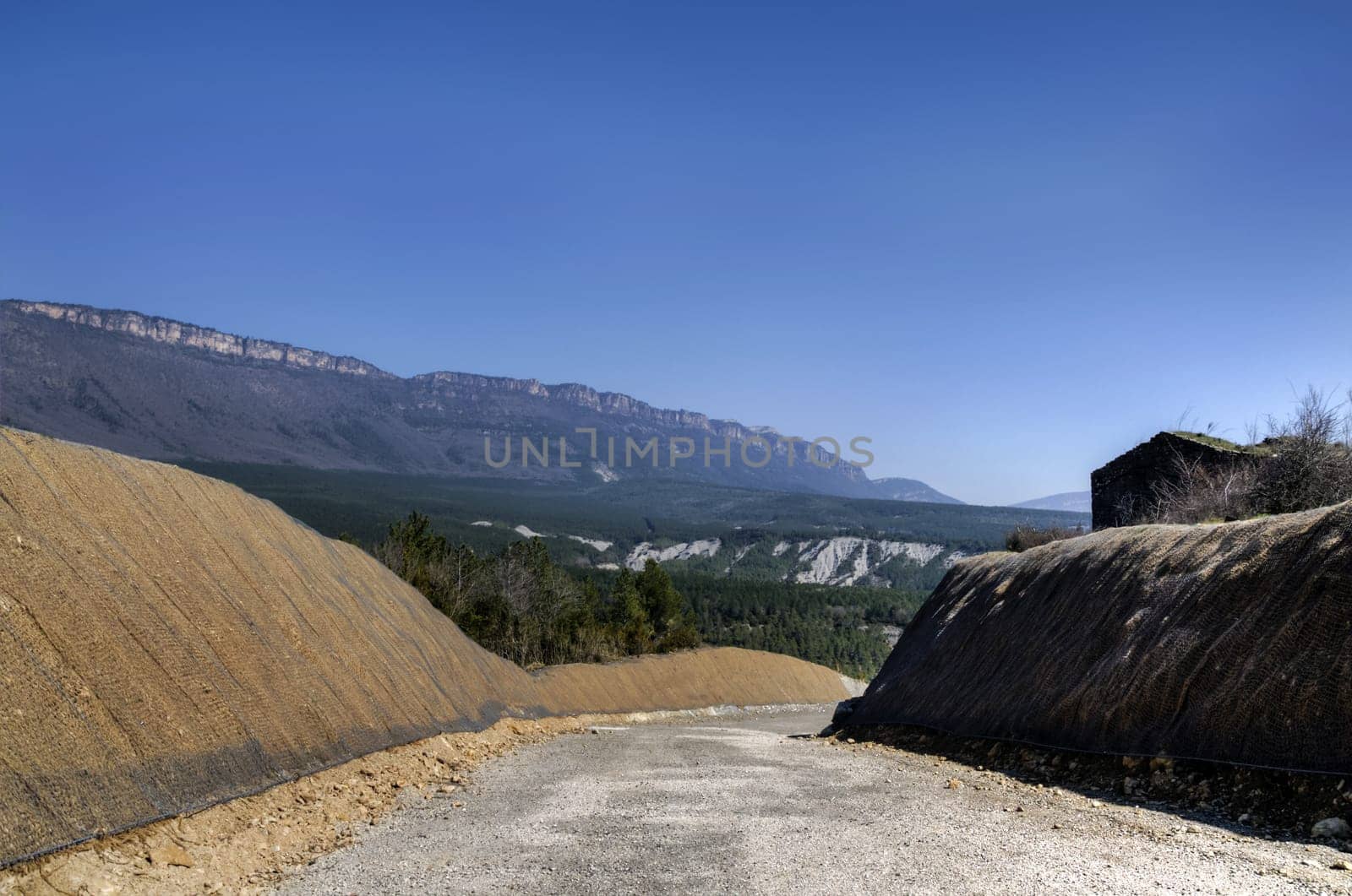 Big unfinished road on the hill at one village in Spain