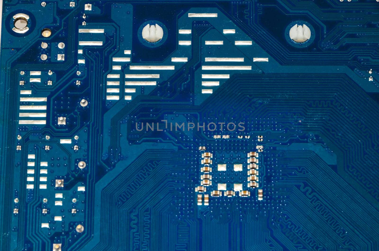 Macro Photo Of Electronic Circuit. Pcb On The Lighting.