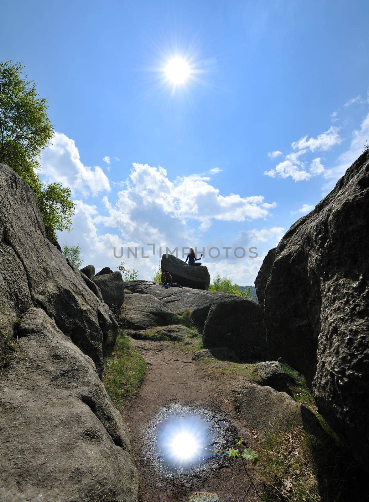 Woman with dog in Okertal,Harz,Germany.Praying wheel from Tibet.