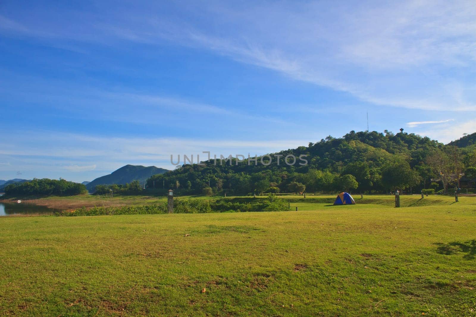 Camping in the wilderness, tent on campground in morning