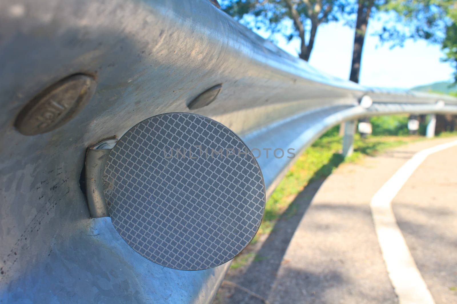 guardrail, is a system designed to keep people or vehicles from straying into dangerous or off-limits areas.